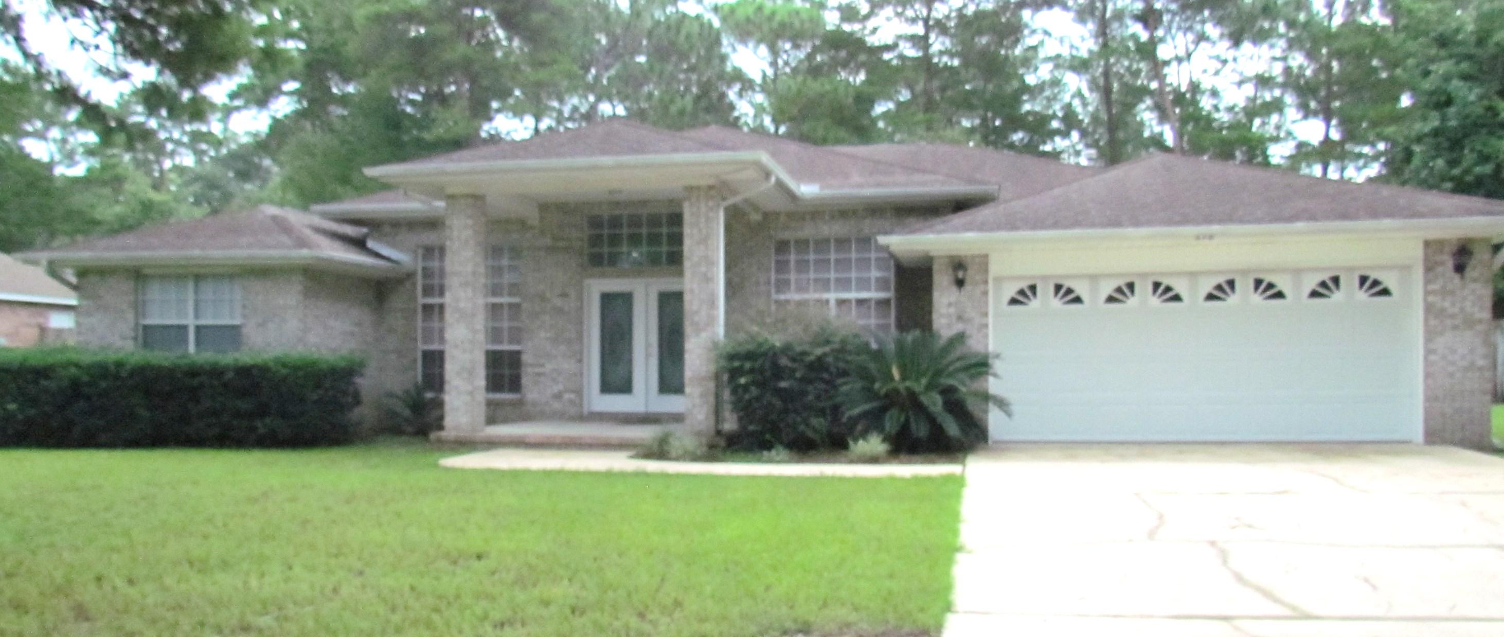 Lovely 4 bedroom 3 full bath home in quiet Rocky Bayou neighborhood of Rocky Bayou Estates. Brick home features privacy fenced back yard with double gate, perfect for parking your boat or RV. Split floor plan with ''mother in law'' bedroom with ensuite bath. Master has trayed ceilings with double french doors to screen porch and ensuite bath with separate shower, garden tub 2, and double vanities. 2 car garage with automatic garage door opener. Separate indoor laundry room complete with gas or electric dryer hook up and laundry tub. Formal dining room as well as large eat in area of the kitchen. Formal livingroom or office at the front of the house as well. Owner will consider a pet that is spayed/neutered and fully housebroken. Available now.Refrigerator is not warenteed.