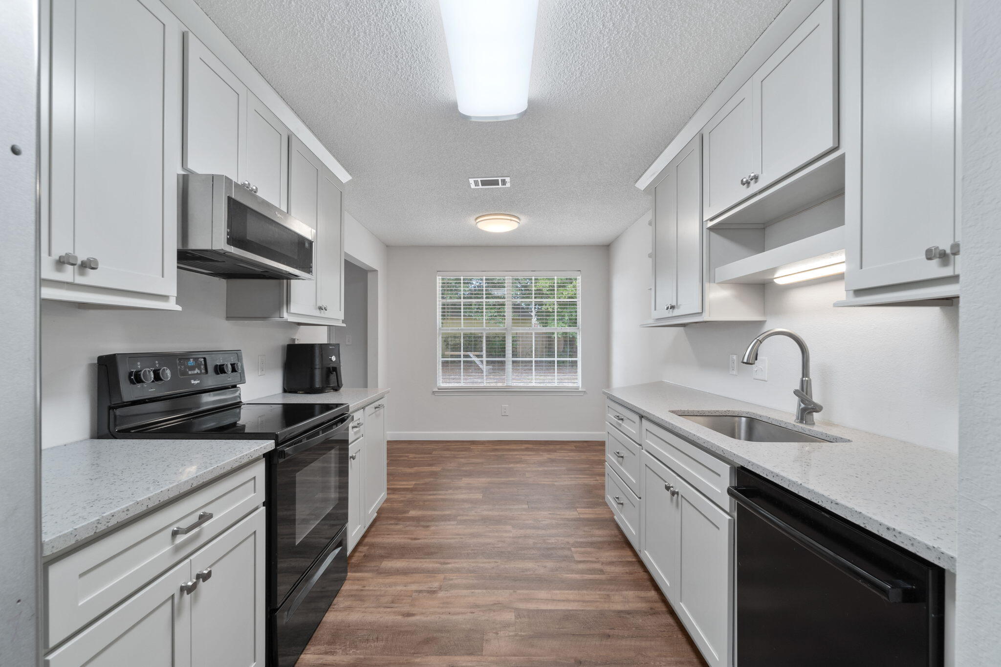 *New Roof in 2021!* Bring your boat and/or RV! Welcome home to this fantastic newly renovated home on a cul-de-sac lot in the popular neighborhood of Country Breeze Estates! Pull up into the oversized driveway and you'll find plenty of room for parking including an extended pad behind the double gate complete with an RV hookup. Inside this brick ranch you'll love the new luxury vinyl plank flooring that extends throughout perfectly finished with new baseboards and door molding. In addition to three bedrooms there's also a flex space perfect for an office or playroom! The gorgeous kitchen has been renovated with all new cabinets, undermount sink, and granite counters and is finished with stainless appliances, an eat in kitchen space, and pantry. Appreciate updated light fixtures throughout and the great sized interior laundry room. You'll love the split floor plan with two nice sized bedrooms with ample closet space on one side of the house, and the spacious master bedroom on the other. The owner's bathroom features double vanities, TWO walk in closets, and a gorgeous walk-in tiled shower. There is a two car garage and an oversized pie shaped backyard. Roof replaced May 2021, water heater replaced in August 2013, HVAC replaced in April 2013. Welcome to your new home!