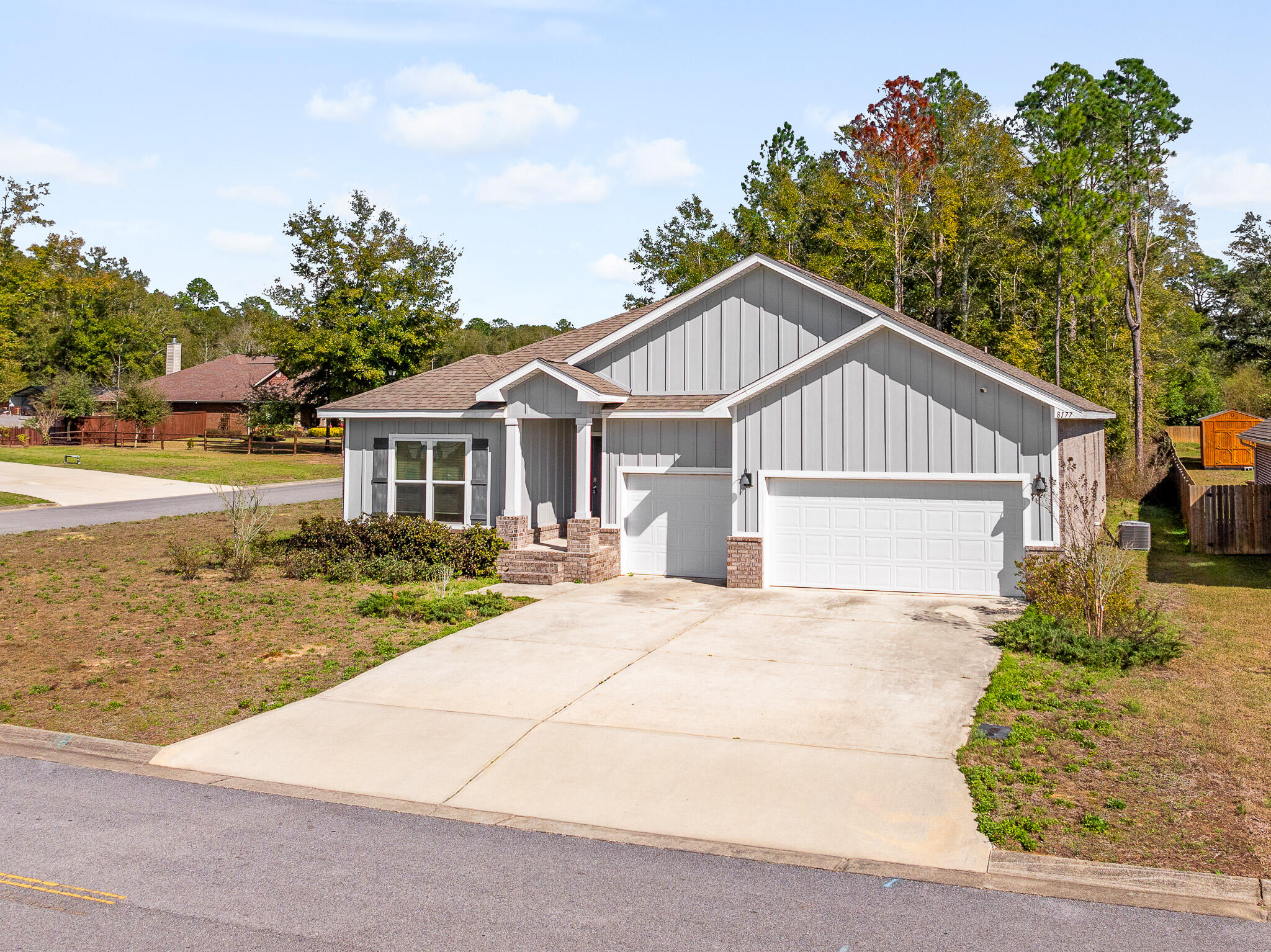 Welcome to 8177 Majestic Cypress Dr, a beautifully maintained and spacious home on a corner lot over half an acre in Milton, FL. Nestled among mature trees, this property offers endless possibilities, with plenty of space to add a pool, garden, storage shed, or even room for a boat or RV if cleared.

Boasting over 2,800 sq ft of living space, this home features 4 bedrooms, 4 bathrooms, a flexible bonus room, and a 3-car garage. The bonus room is ideal for a mother-in-law suite, home office, gym, or playroom, whatever fits your lifestyle.

The open-concept layout includes a large kitchen with granite countertops, stainless steel appliances, a walk-in pantry, and an oversized island perfect for gatherings. The primary suite offers a peaceful retreat with a garden tub, separate walk-in shower, double vanity, and spacious walk-in closet.

Additional highlights include a Jack & Jill bedroom setup, fresh interior paint, a huge laundry room, security system, and a fully resodded yard (in progress).

Located in a desirable HOA community with convenient access to I-10 and Whiting Field, this home offers both space and comfort with room to grow.