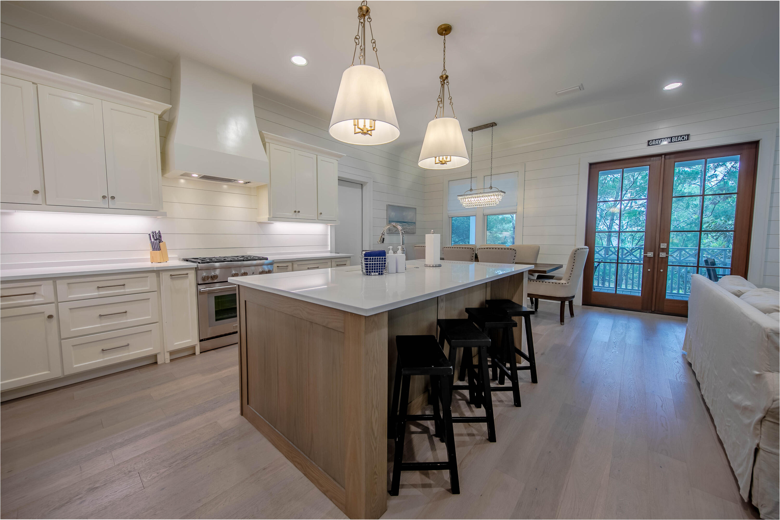 Located in the gated Preserve at Grayton Beach, this beautifully crafted coastal retreat built by Vlahos, DeBogory & Tuck offers refined living on 30A. Built in 2020, this 4 BR/4.5 BA residence features an open-concept floor plan and designer kitchen with quartz countertops, custom cabinetry, Thermador gas range/dishwasher and Bosch refrigerator. The main-level primary suite provides a peaceful escape, while upstairs there is an additional living room and three bedrooms. The home offers impact-rated windows and doors, a one-car garage, and a screened-in back porch. The community features private beach access, two pools, tennis and pickleball courts, and is just minutes from Grayton Beach and Seaside. Beach front chair and umbrella setup included through 2026 season. The home has a strong rental history with excellent reviews.