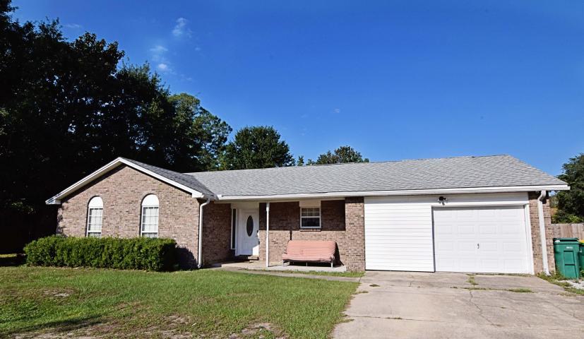Bank approved short sale. This home offers the convenience of living in town but has much more space than the usual small lots. With 5 bedrooms built on two lots with over 1/3 of an acre, there is a lot of potential in this home. Two large separate living areas offer the adults and kids both plenty of room, or you can finally fit the pool table in the house! The yard is fully fenced with room for a pool. The 24 x 30 detached 2 car garage has plenty of space for workshop or car repair. Parking for your RV, boat or extra cars is not a problem. Some work needs to be done, but a buyer willing to do that will be rewarded. Recent appraisal at $253,300.