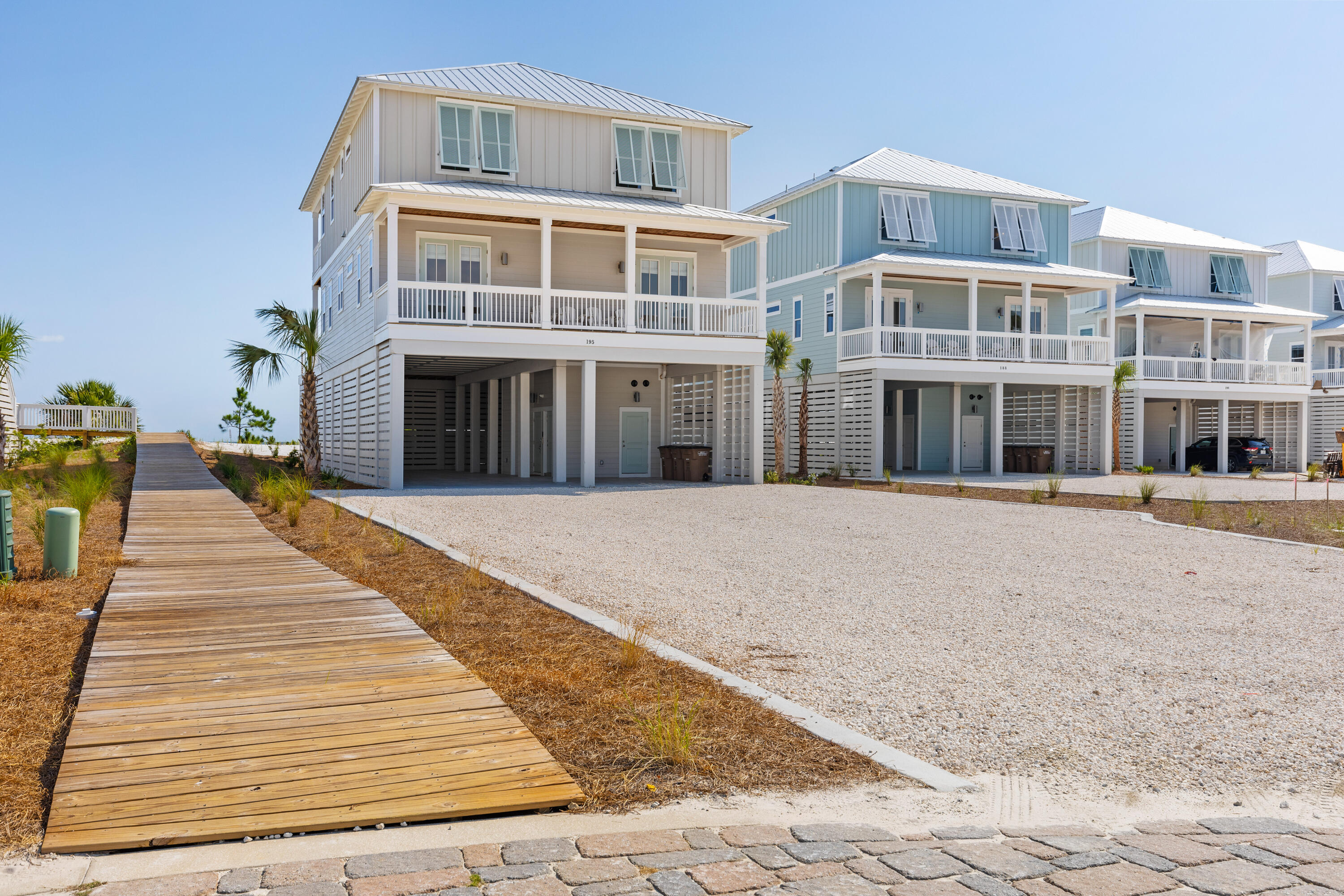 Monterey Beach House is a 3,010 sq ft, 5-bedroom, 5-bath luxury home in the gated Villa del Sol community. Built in 2023, it offers two expansive Gulf-view decks, a private elevated pool, and a boardwalk directly to the beach. The open living, dining, and kitchen area features hardwood floors, quartz countertops, modern appliances, and stunning ocean views. The first floor includes two bay-view master bedrooms with king beds—one with an en-suite bath—plus a full bathroom, laundry room, elevator, and an ice machine. Step outside to the deck and enjoy the heated-optional private pool. The second floor features two oceanfront master suites with king beds, private baths, and shared access to a large Gulf-facing deck. A spacious bunk room includes three bunk beds (two Full-over-Queen and one Twin-over-Twin) and its own full bathroom with bay views. A private boardwalk brings you to miles of white sand and clear Gulf water, perfect for beachcombing, swimming, kayaking, fishing, or relaxing in the sun. Port St. Joe is just 15 minutes away with shops, dining, galleries, and ferry service to St. Vincent Island. Nearby Salinas Park offers pickleball courts, playgrounds, a fire pit, and access to a 19-mile paved trail. Apalachicola, known for its historic charm and seafood, is about 25 miles away. Villa del Sol features gated access, brick-paved streets, beach boardwalks, a community pool, and pickleball courts. Enjoy easy Bay access for kayaking and fishing, plus miles of pet-friendly shoreline. Some dimensions and measurements were obtained via the Gulf County Property Appraiser's website. Please verify if important.
