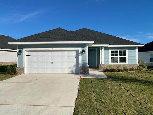 Home is under construction with completion expected in Dec 2024.
New community in Freeport.  Popular Craftsman 3 BR/2 BA home with Hardiboard siding and full brick.  Screen enclosure makes the rear patio over the top! The interior features a spacious master bedroom (14x22), vaulted ceiling in Great Room and 9' ceilings elsewhere.  8' entry doors, granite countertops in kitchen and baths and durable Coretec Pro Plus LVP flooring throughout; no carpet. Trey ceiling in master bedroom with a large walk in closet.  Generous covered patio.  Garage door opener, attic pull-down stairs, fully sodded yard with sprinkler system + well and pump. 
Seller pays most closing costs with approved lenders. Community pool to be built by developer.