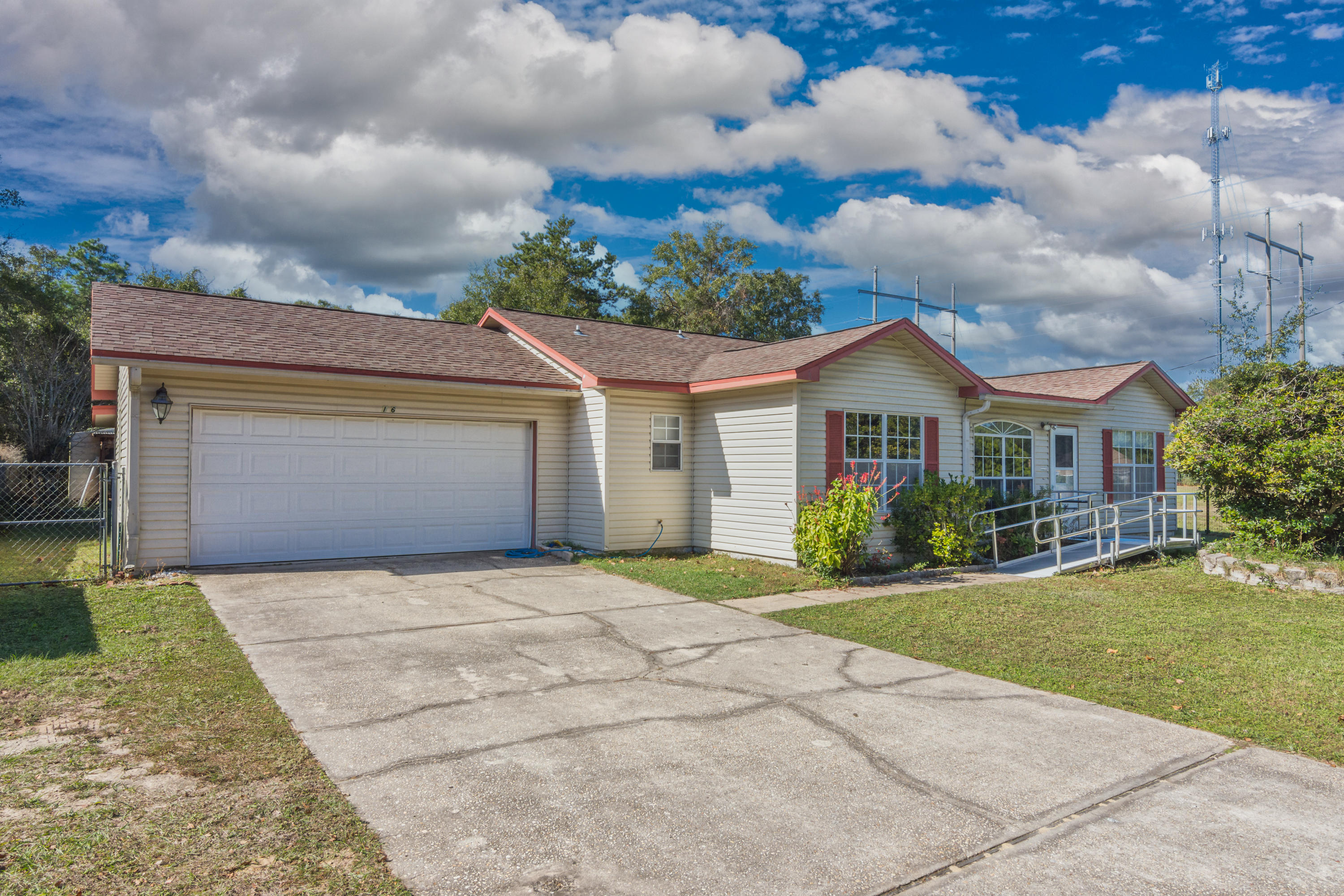 Location location location! This cozy home located in South Crestview is a must see. Your new home provides an easy commute to your local military bases, beautiful beaches on the Emerald coast, shopping, restaurants, and doctor offices/hospital. Your new home also has tons of wonderful features inside and out. The large living room with a high vaulted ceiling and corner fireplace make the perfect room for large family gatherings. The split bedroom design is great for extra privacy from the kids and guest after a long days work with a nice walk in tiled shower for easy access and use. Last but not least you have a heated and cooled 300 sqft Florida room out back and 2 workshops. The larger workshop has power and is ready for all your weekend hobbies! Call to schedule your appointment today!