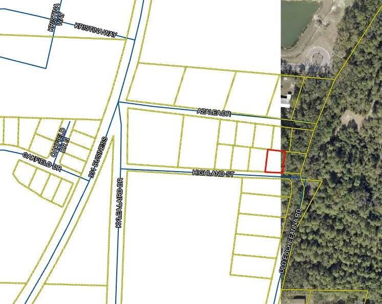 Vacant Lot between the Elementary and Middle Schools.   Power, Water Taps and Sewer Taps available.  No CC&Rs and No HOA dues.
