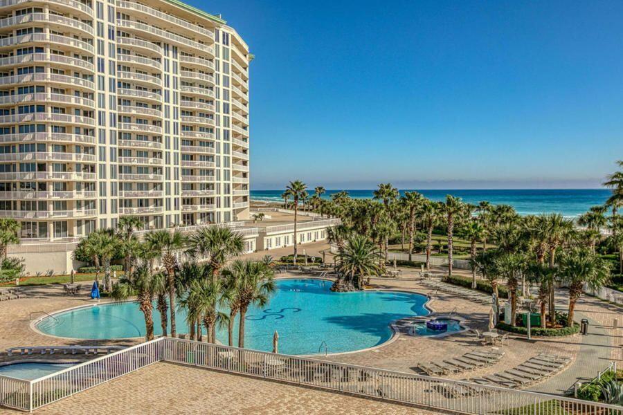 Breathtaking views from this spacious 3br 3ba Gulf front condo. Located in non-rental ST Thomas in Silver Shells Resort. This 5th floor unit is the perfect elevation. Endless views of Destin's famous emerald green waters and the sugar white sand beaches. Travertine floors though out. New light fixtures and fans. Freshly painted inside and out. All bathrooms renovated with seamless glass enclosures. Master Bath has Jacuzzi. HOA includes membership to Destin Health & Fitness, Cable and Internet,, trash pickup, and City water. Condo has private pool, garage parking space, climate control storage, access to large pool, horse shoe pits, cornhole games, and around the clock security with gated entrance and guard. Beautiful landscaping with direct access to Beach.