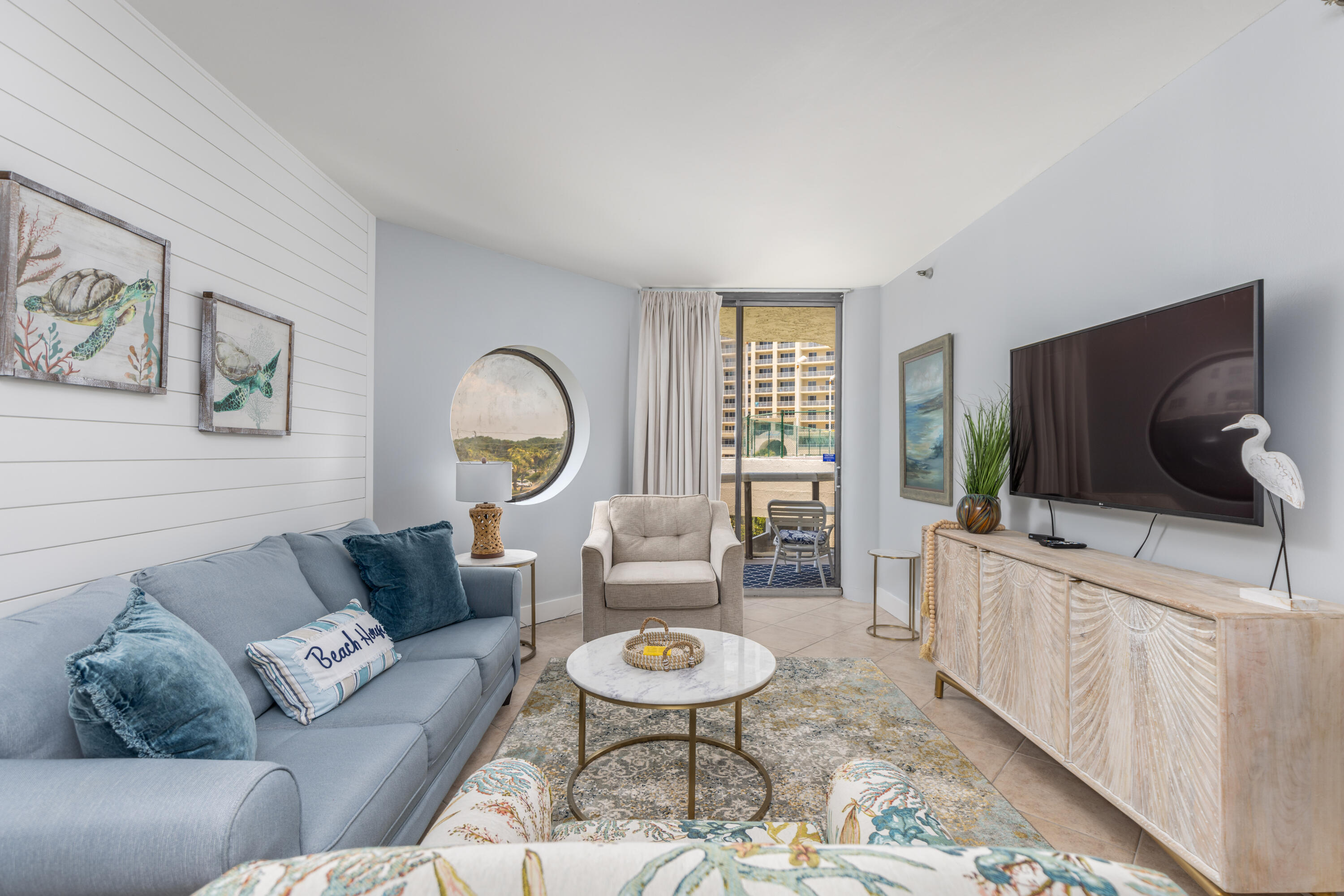 Attention Investors: Rental demand for L6 Surfside continues to strengthen, with bookings currently up approximately 50% year-over-year, and the opportunity to capture peak summer rental income still ahead. This completely renovated one-bedroom, two full bath condo offers an ideal combination of personal enjoyment and proven rental appeal. As you step inside, you're welcomed by an open-concept living space that seamlessly connects the fully equipped modern kitchen with the inviting living and dining areas--perfect for entertaining or relaxing after a sun-filled day at the beach. The sleeper sofa allows the unit to comfortably accommodate four guests, maximizing rental flexibility. The oversized balcony offers the perfect place to enjoy fresh Gulf breezes and partial Gulf views, while the  spacious primary suite features a king-size bed, full ensuite bath, and direct balcony access. A second full bathroom located off the kitchen provides added convenience for guests--an uncommon and valuable feature in one-bedroom rentals. Located on the highly desirable lanai level, this unit offers unmatched convenience with direct access to many of Surfside Resort's amenities including The Royal Palm Bar & Grill, heated pool, multiple hot tubs, fitness center, tennis and pickleball courts, elevated beach walkover, and 300 feet of private beach with beach service. Whether you're seeking a turnkey vacation rental or a personal beach retreat with income potential, L6 Surfside offers strong rental performance and an opportunity to benefit from the upcoming high-demand summer season.