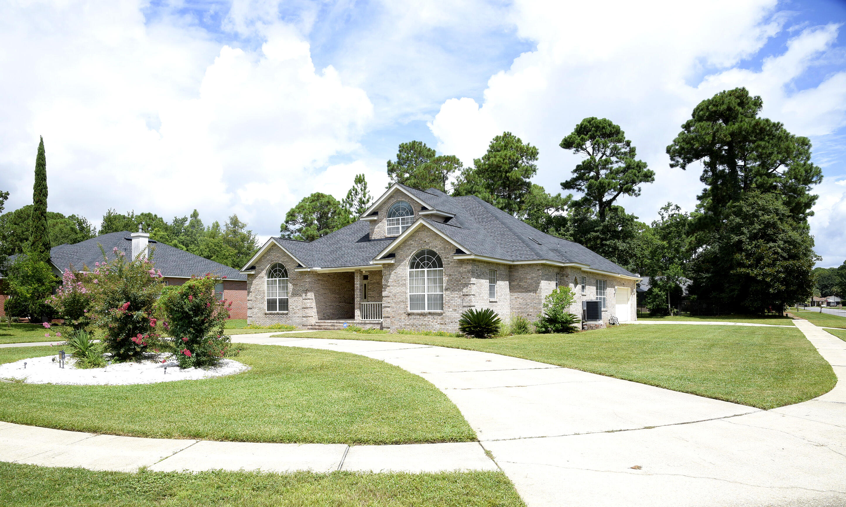 Come see this one owner home with water views in beautiful Dana Pointe!  The custom built home has many nice features such as heavy crown molding, multiple living areas, a walk-in pantry off the kitchen, family room with gas fireplace and built-in bookshelves. The  split bedroom floorplan features 3 bedrooms on the main level with en suite bathrooms plus a large bonus room upstairs that could be used as a 4th bedroom. There is also a Florida room, screened in patio and floored walk-in attic for all your storage needs. The owner has lovingly maintained the home and installed a new roof in April 2022, and new HVAC and water heater in October 2019. It's ready for you to add your own cosmetic updates and decorating preferences.