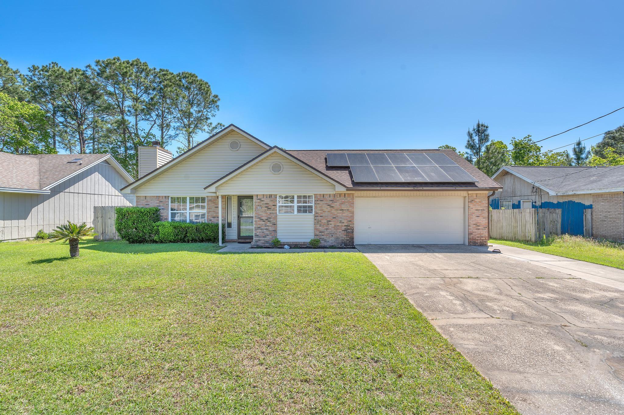 Introducing this charming 3-bedroom, 2-bathroom home with a location convenient to military bases, shopping, and schools in Ft. Walton Beach, FL. This beautifully designed house features LVP flooring in the living areas and gorgeous tile in both updated bathrooms. The kitchen showcases quartz countertops and stainless steel appliances, perfect for those who love to cook and entertain. The fenced back yard offers privacy and security, while the pergola and fire pit provide a cozy outdoor space for relaxation and gatherings. Don't miss out on the opportunity to make this house your home! Call/Text/Email for your showing today!! ***Pets considered. Electric is provided w/ payment of $100/mo ''solar fee''***