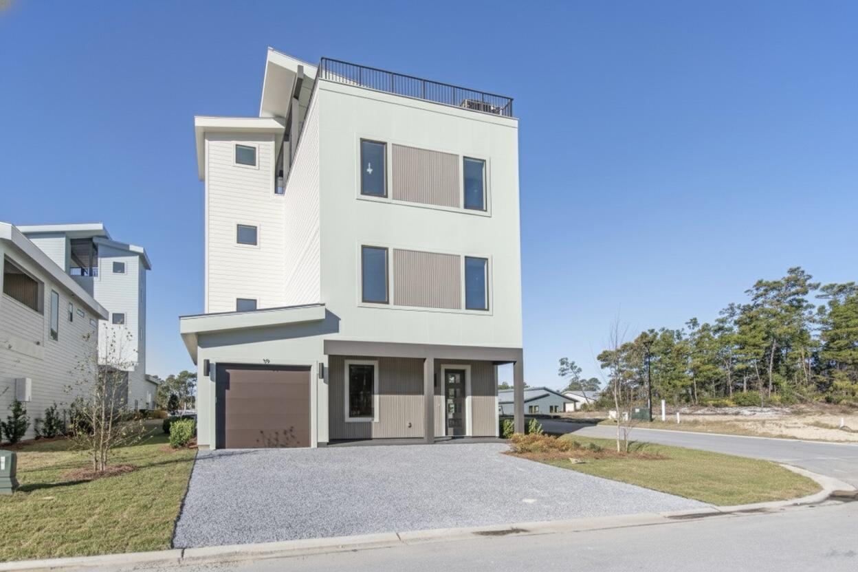 QUICK MOVE IN!! This home comes fully furnished & turnkey ready! Please ask about rates starting as low as 5.75%. Welcome to Wildwood at Inlet Beach, where modern elegance meets coastal charm. Crafted by Bluscape Homes, this brand-new South Walton community seamlessly blends luxury with beach living. Perfectly positioned near top-tier dining, shopping, and entertainment, you're just moments from 30 Avenue, Rosemary Beach, Lake Powell, Camp Helen Gulf Front State Park, and the largest regional beach access in South Walton. Everything you need for an exceptional coastal lifestyle is right at your doorstep. The pedestrian underpass on Hwy 98 offers safe & easy access to all the wonders of 30A without crossing the highway. Introducing the SkyBlu, Wildwood's premier floor plan, featuring a breathtaking rooftop deck that adds 1,000 square feet of outdoor living space and panoramic views in every direction. This thoughtfully designed home boasts 6 king-sized en suite bedrooms, two dens, and an optional elevator that whisks you to your rooftop oasis, perfect for unforgettable sunsets. The deck is hot tub-ready with reinforced construction and offers the option for a luxury outdoor kitchen. Inside, enjoy three levels of sophisticated living with high-end finishes like Quartz countertops, GE Profile appliances, stylish flooring, and designer lighting. Additional highlights include a garage and generous front parking. Make this coastal paradise yours and start living the good life today!

**Price reflects the base home cost and lot premium. Final price may vary depending on selected options**.
