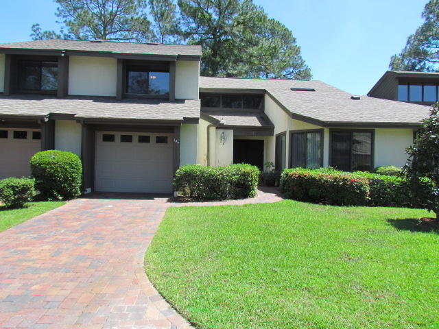 All updated Gleneagles townhome. Unit is on the 2nd. hole of the Bay golf course in Bluewater Bay. This unit features gourmet kitchen with Induction cook top, stainless appliances & island, great room with tongue & grove detailing, first floor master suite with access to private patio. Screened Florida room with views of the golf course. Unit even features an upstairs office/bonus room which could be used as an additional bedroom. Oversized single car garage with work bench and cabinets and stacked washer/dryer (non-warranted).Unit available June 6. Sorry no pets & NO smoking. $2000 per month. Any person 18 years or older who would be living in the unit need to submit separate applications and pay separate application fees.