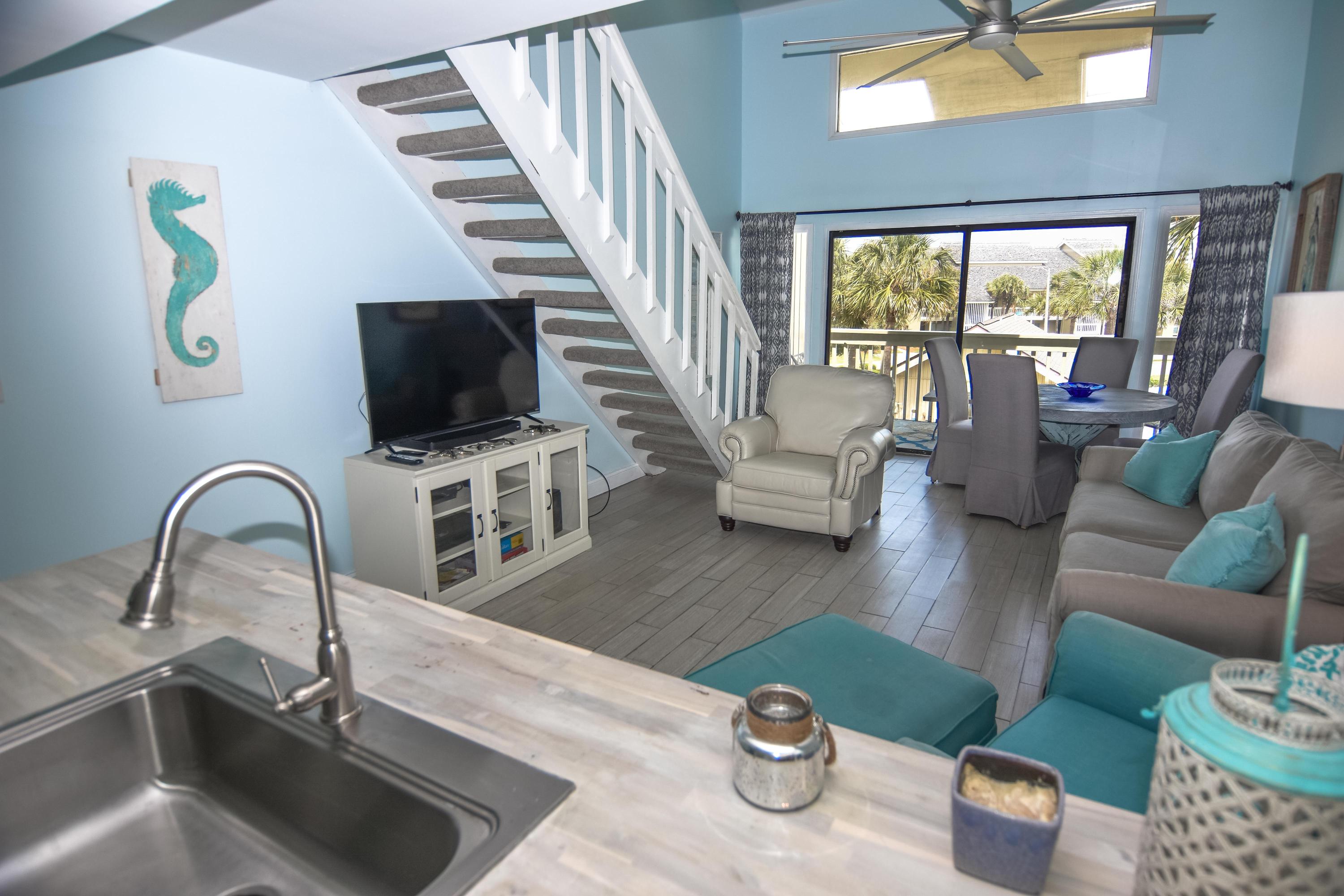 Your search for the ultimate in coastal living is over with this condominium, behind the guarded gates of the Seascape Resort. Overlooking one of the five sparkling community pools and a slice of Gulf of Mexico views to your right, you do not want to miss this piece of heaven at the beach! An extraordinary upgraded 2 bedroom and 2 bathroom condo located on the top floor in the most coveted part of Seascape ( closest to the beach and Whales Tale). Some of the most recent updates include gorgeous new countertops in the kitchen, new fuse box, and upgraded guest bathroom! With over 1,000 square feet in this bi-level condo, you will never feel cramped for space. Come see this beautiful condo perfect for vacation rental or as a primary/second home!