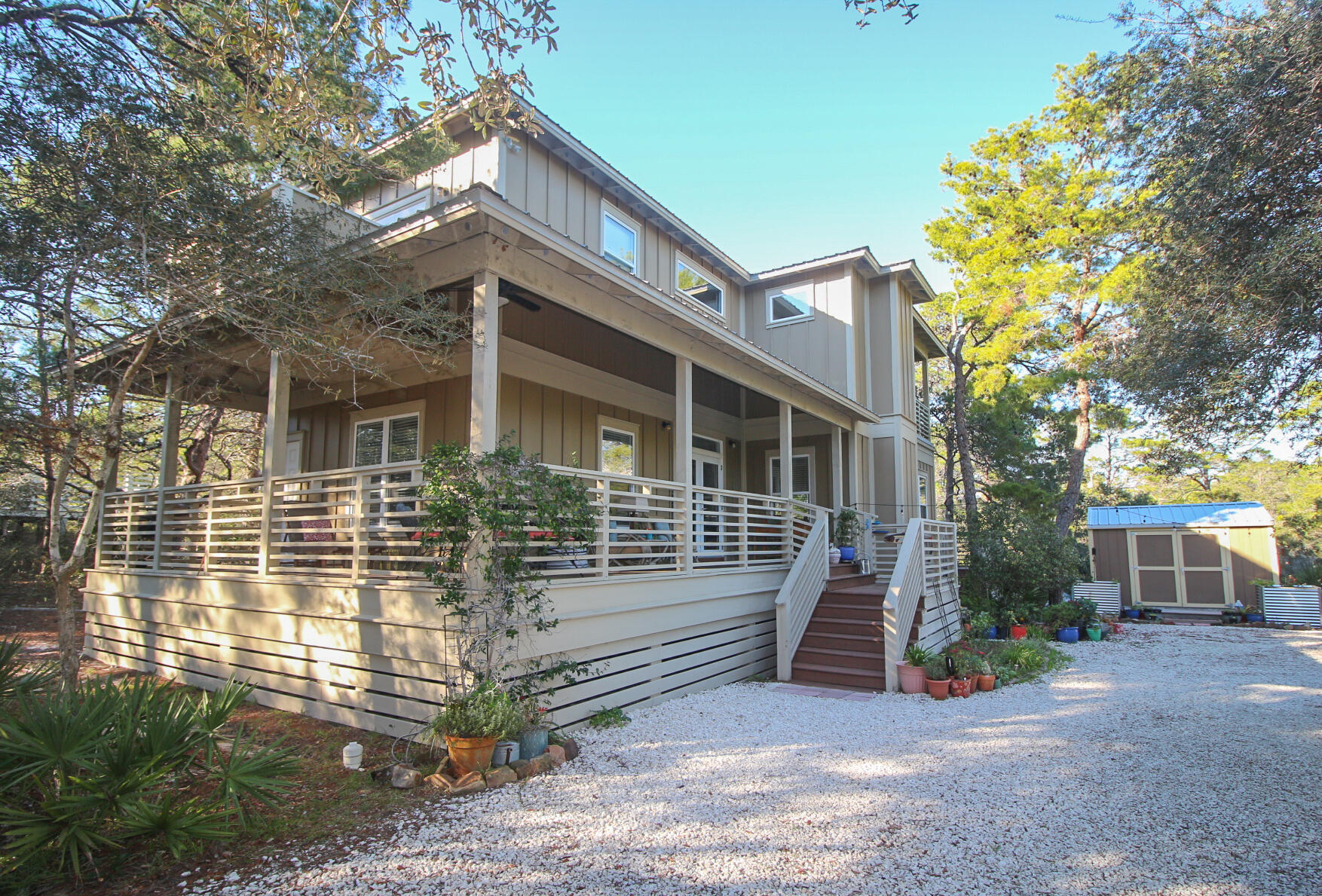 This classic beach cottage sits on a private half-acre lot, one block off 30A. It's close to two wonderful beach accesses, excellent Blue Mountain Beach restaurants and the State Forest. There are plenty of recreational opportunities within walking distance or a bike ride along the Timpoochee Trail. An abundance of natural light makes the home feel larger than its 1940 square feet. Solid wood floors in all rooms but baths and laundry room; all bedrooms have a full bath; upstairs bedrooms include a private porch. New refrigerator, microwave, dishwasher and hot water heater in 2021. Enjoy a 1st-floor verandah in front and a deck along the back that leads to a (hot water outdoor) shower. The lot is low-maintenance, and there is a shed with plenty of storage for beach gear.