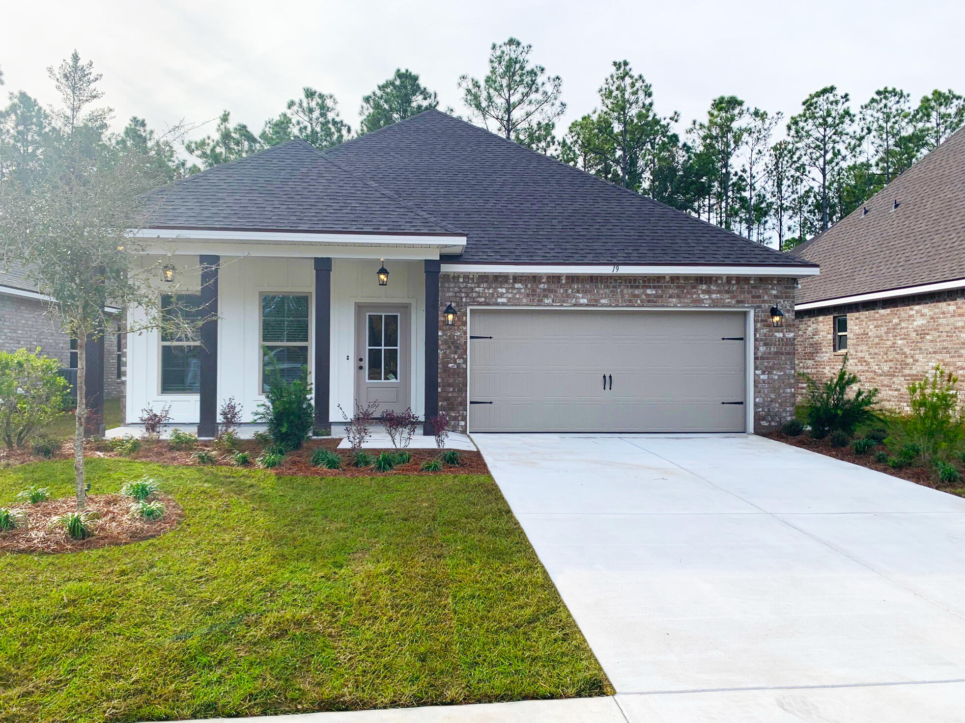 Awesome Builder Rate Incentives!  (Restrictions apply) 

The OAKSTONE IV H in Moonswept at Hammock Bay community offers a 4 bedroom, 2 full bathroom, open design.  Upgrades added (list attached).  
Features: double vanity, garden tub, separate custom tiled shower with frameless door, and walk-in closet in the master suite, walk-in closet in bedroom 3,  covered patio, recessed lighting, undermount sinks, framed mirrors, smoke/carbon monoxide detectors, landscaping package, architectural 30-year shingles, flood lights, and more!
Energy Efficient Features: water heater, kitchen appliance package, vinyl low E windows, and more!