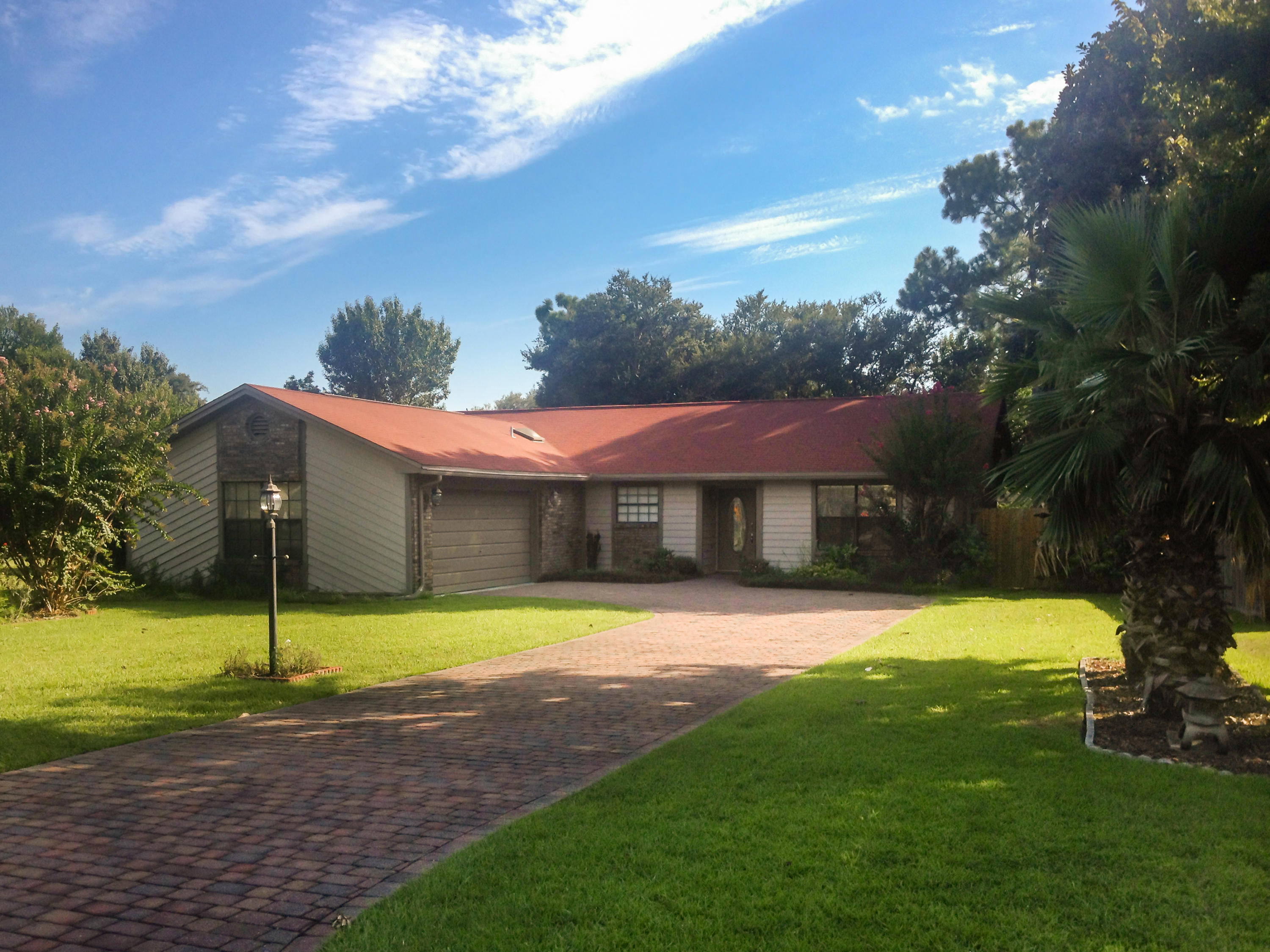 Florida heat have you sweating? Come splash away your cares in this beautifully remodeled Bluewater Bay pool home! This home features gorgeous wood floors, smooth ceilings, and upgraded light fixtures throughout. The spacious custom kitchen has granite countertops, stainless appliances and opens to the living room across a nicely sized island. Lounge around in the outdoor space under the large covered lanai by the professionally maintained pool. Call to make an appointment to see this home today! No pets and no smoking allowed in this home.