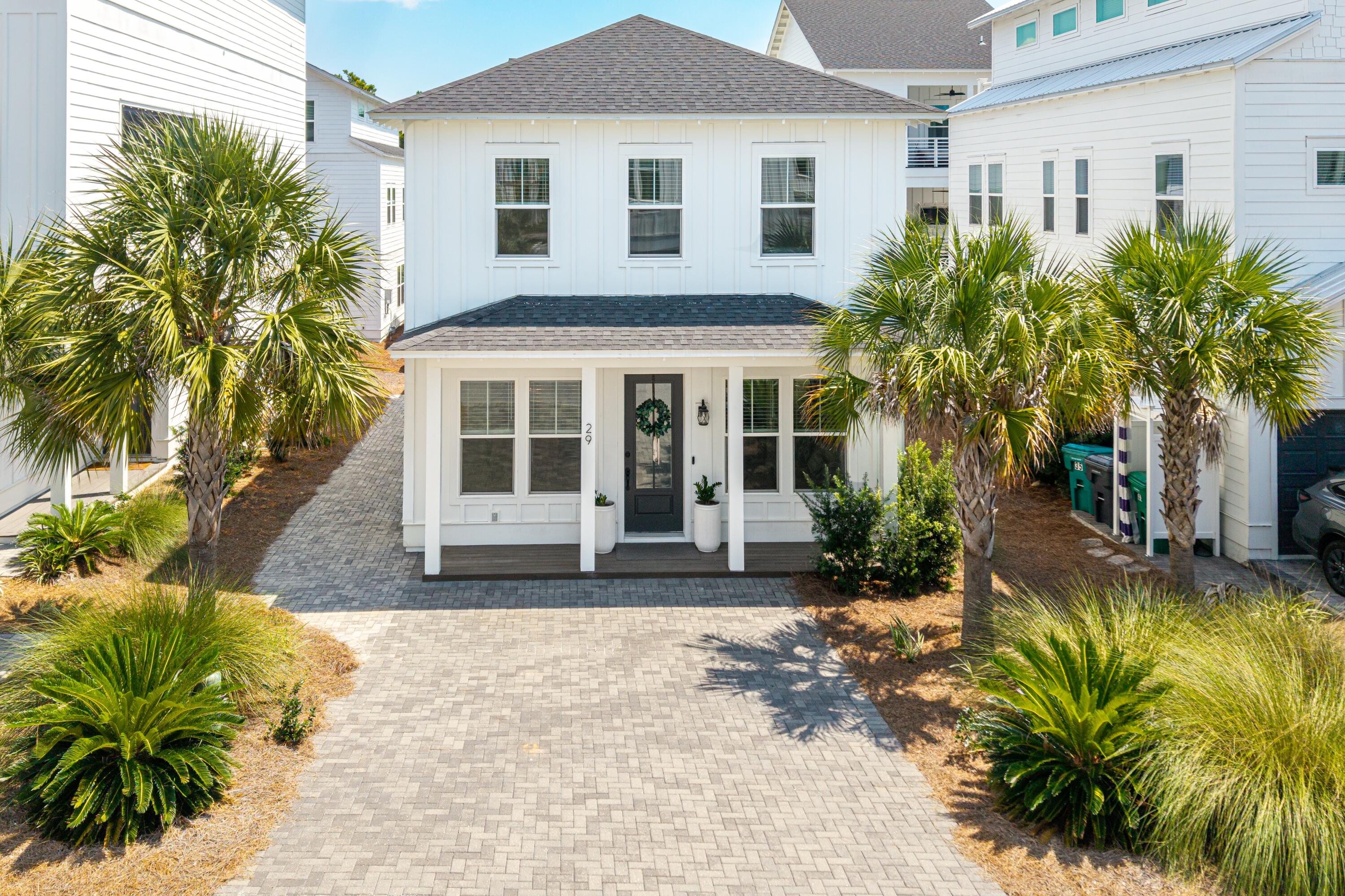 Priced at $799,500, 29 Beach View presents a rare opportunity to own a like-new home in The Ivy at Inlet Beach, featuring a custom floor plan found nowhere else in the neighborhood. Built in 2021 and used exclusively as a second home, it has been impeccably maintained and shows beautifully.
Designed for comfort and versatility, the home offers a first-floor primary suite plus two additional bedrooms, each with its own private bath, making it ideal for guests, family living, or short-term rentals. The kitchen is both stylish and functional with double ovens, a gas cooktop, and ample space for entertaining, while a second-floor living area provides the perfect retreat to relax or gather. An oversized storage room easily accommodates bikes, beach gear, or an owner's closet. All of this is just steps from Walton County's largest public beach access, 30A, the community pool, and the shops and dining of 30Avenuea location that continues to drive strong rental demand and lifestyle appeal.
Whether you're searching for a high-performing investment or a full-time coastal retreat, 29 Beach View stands out as one of the best values in the 30A/Inlet Beach market.