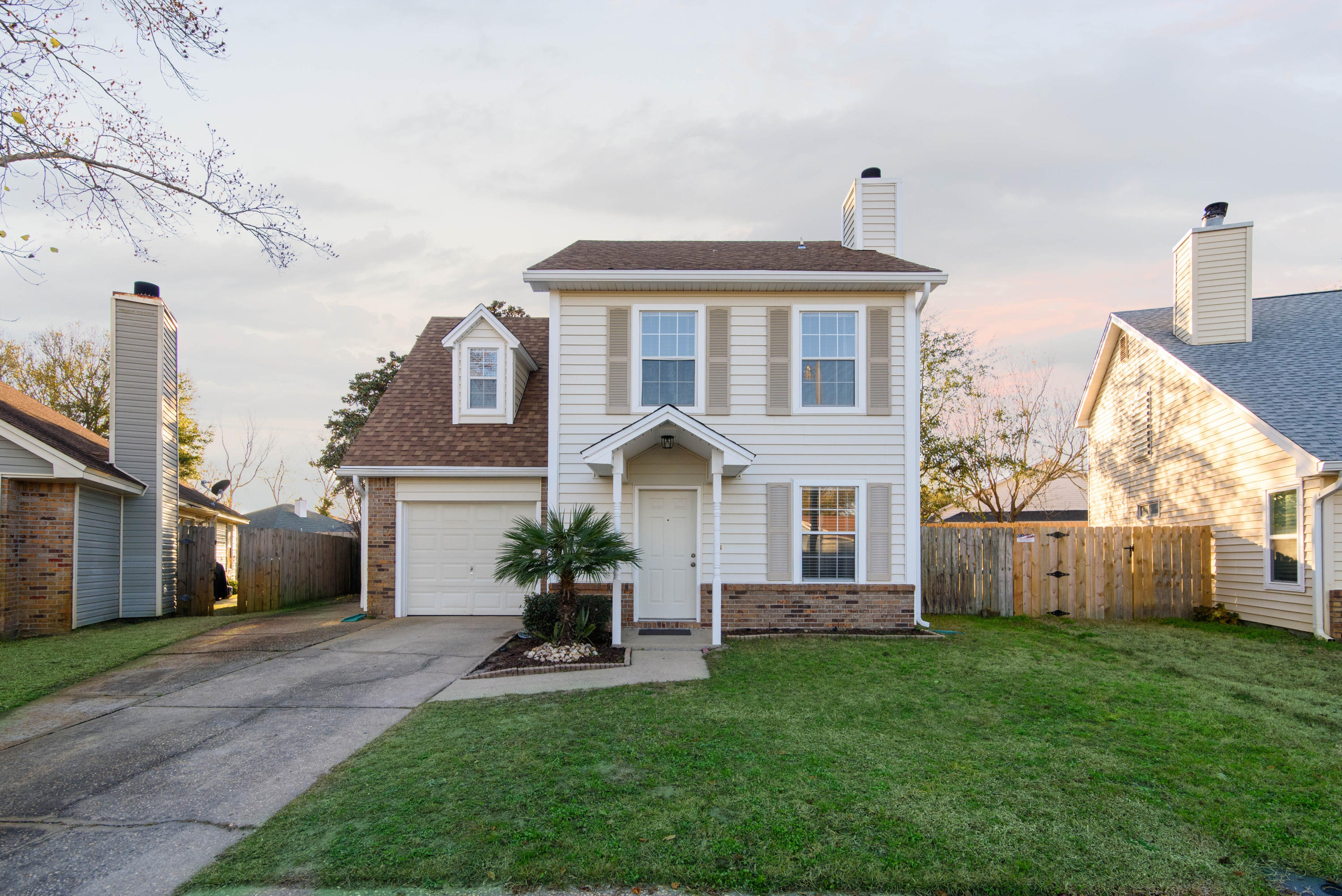 MOVE-IN Ready beautiful 3 Bedroom, 2 1/2 Bath home with a 1 Car garage just ONE MILE from Hurlburt Field. This house is located in a well-established, quiet neighborhood that is great for families. Don't let the age fool you this owner has done many renovations to include Brand NEW ROOF, INSULATED VINYL SIDING, Tile throughout the first floor, laminate flooring in all 3 Bedrooms, whole house re-plumbed with a PEX PLUMBING SYSTEM, 2013 50 Gal. WATER HEATER, 2017 HVAC, and fresh paint throughout!

Upon entering you will be welcomed by the well-designed large living room that features a wood-burning fireplace and tiled floor. Towards the back you will see a spacious eat-in kitchen with stainless steel appliances and 2 pantries. From your kitchen walkout to a nice patio for entertaining and fully fenced inbackyard. Plus an oversized driveway where you could park a small boat. 

This home is conveniently located, has been well maintained, and needs a family to call it home.