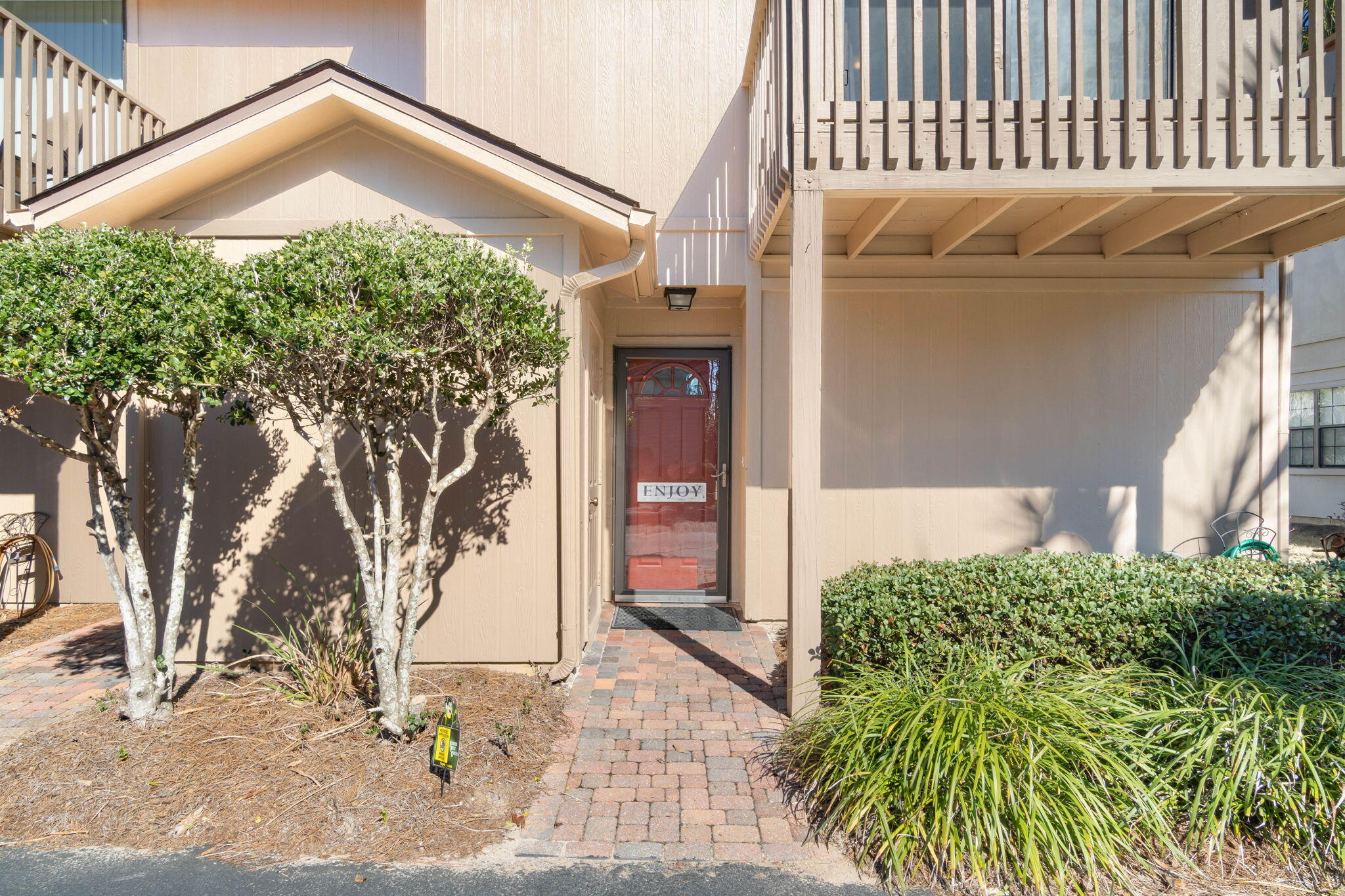 Location Location Location! This 1,252 SF corner unit is across the street from the white sand beach and emerald waters of the Gulf. Located right on 30A, you're within walking distance of shops, restaurants, and so much more!

This rare corner unit features a half bath for guests! Only corner units have a 1/2 bath feature. Meticulously cared for with private balconies for each bedroom for those quiet mornings with a cup of coffee amidst nature. Want to go for a swim, the pool is just steps away from the backdoor! Cassine Gardens  property line backs up to Point Washington State Forest, which gives you access to the hiking trails steps away away from your door.  Cassine Garden also features a second pool, grills, and a  stocked fishing pond for those leisurely afternoons.