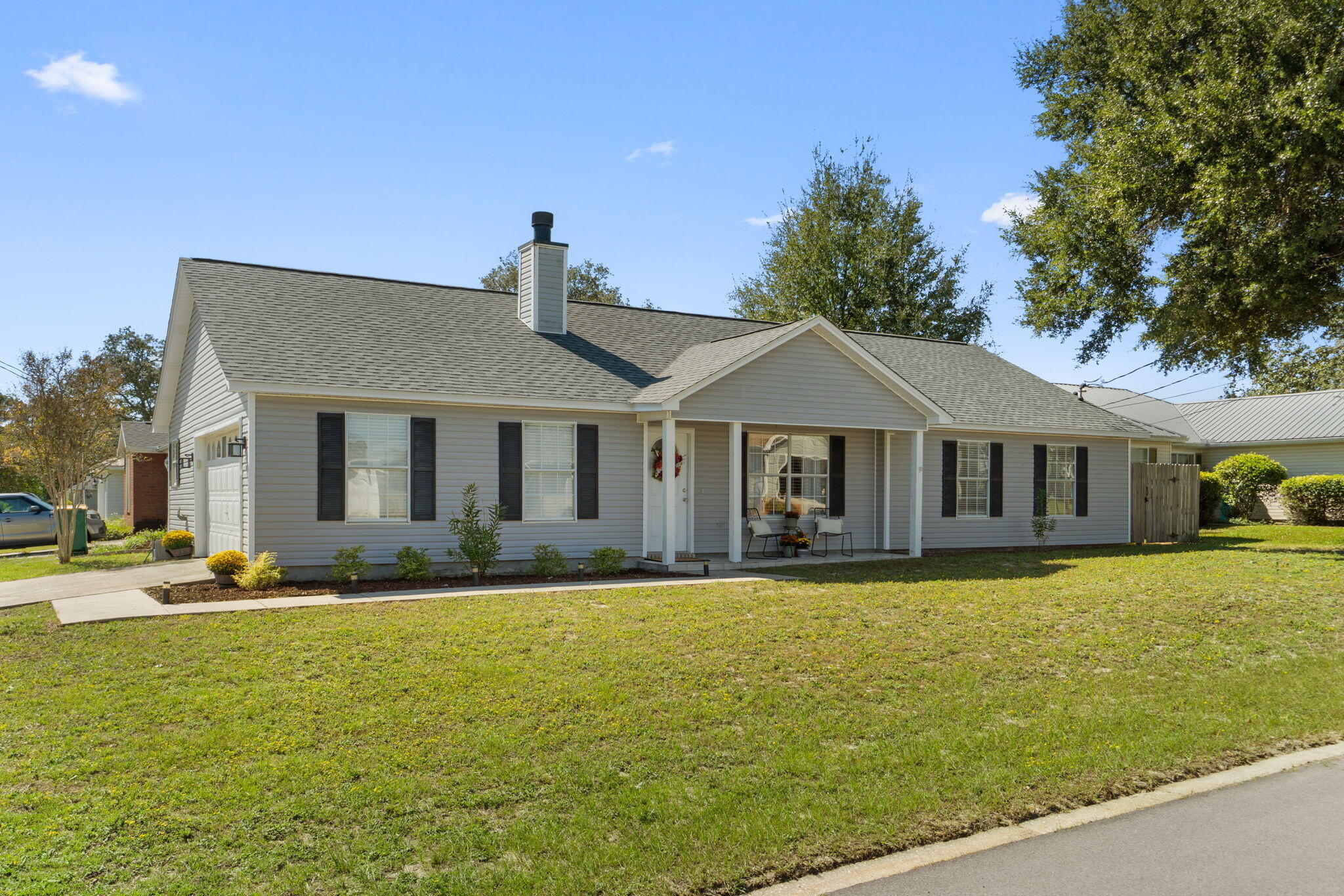 Welcome home to this delightfully updated 3 bedroom, 2 bath ranch in a prime Fort Walton Beach location and close to everything you want and need! Situated on a corner lot with no HOA, this property offers not only convenience, but also peace of mind with a new roof (2024), HVAC (2022), and water heater (2016).

Enjoy an open floor plan ideal for entertaining, featuring a spacious living room with a decorative fireplace, high trey ceiling, and recessed lighting all seamlessly connected to a dining area for easy flow.

The well designed kitchen includes a large hop up breakfast bar, walk-in pantry, and ample cabinet and counter space. Tile flooring extends through all common areas, while the bedrooms feature luxury vinyl plank flooring for comfort and style.

The primary suite easily accommodates a king sized bed and features a tray ceiling with crown molding, a walk-in closet, and an en suite bathroom with an extended vanity, walk-in shower, and linen closet.

Additional highlights include no popcorn ceilings, updated ceiling fans in every bedroom, and a large indoor laundry room with a sink (currently spacious enough to double as a home office!). The two-car garage provides windows for natural light and plenty of storage space with its side entry access. 

This home truly speaks for itself, schedule your showing today!