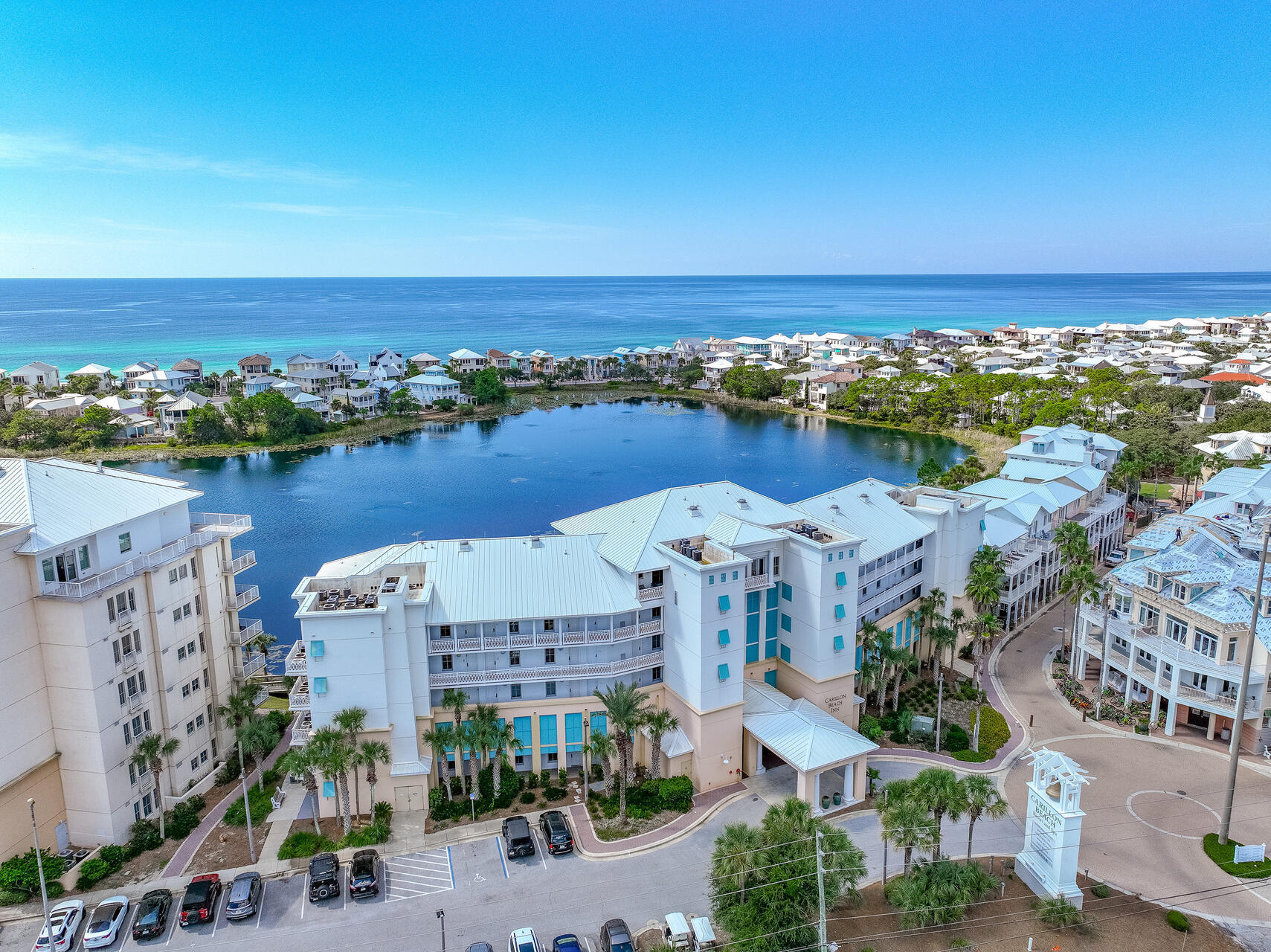 Great opportunity to own a serene beach getaway in the exclusive Carillon Beach Inn. Unit 303 is located on the 3rd floor with serene views of Lake Carillon. Features of this unit include luxury vinyl flooring and coastal furnishings. Turn key and rental ready! Enjoy astonishing sunrises and sunsets from the balcony overlooking Lake Carillon. Carillon Beach Inn is located on the west end of Panama City Beach with quick access to Pier Park, Lake Powell, and 30A. Carillon Beach Resort amenities include over 3,900 ft. of white sand beaches, 4 community pools, 2 hot tubs, tennis, yoga studio, fitness center, retail shopping and dining. This unit is ideal for a beach getaway or investment property. Coastal living at its finest!