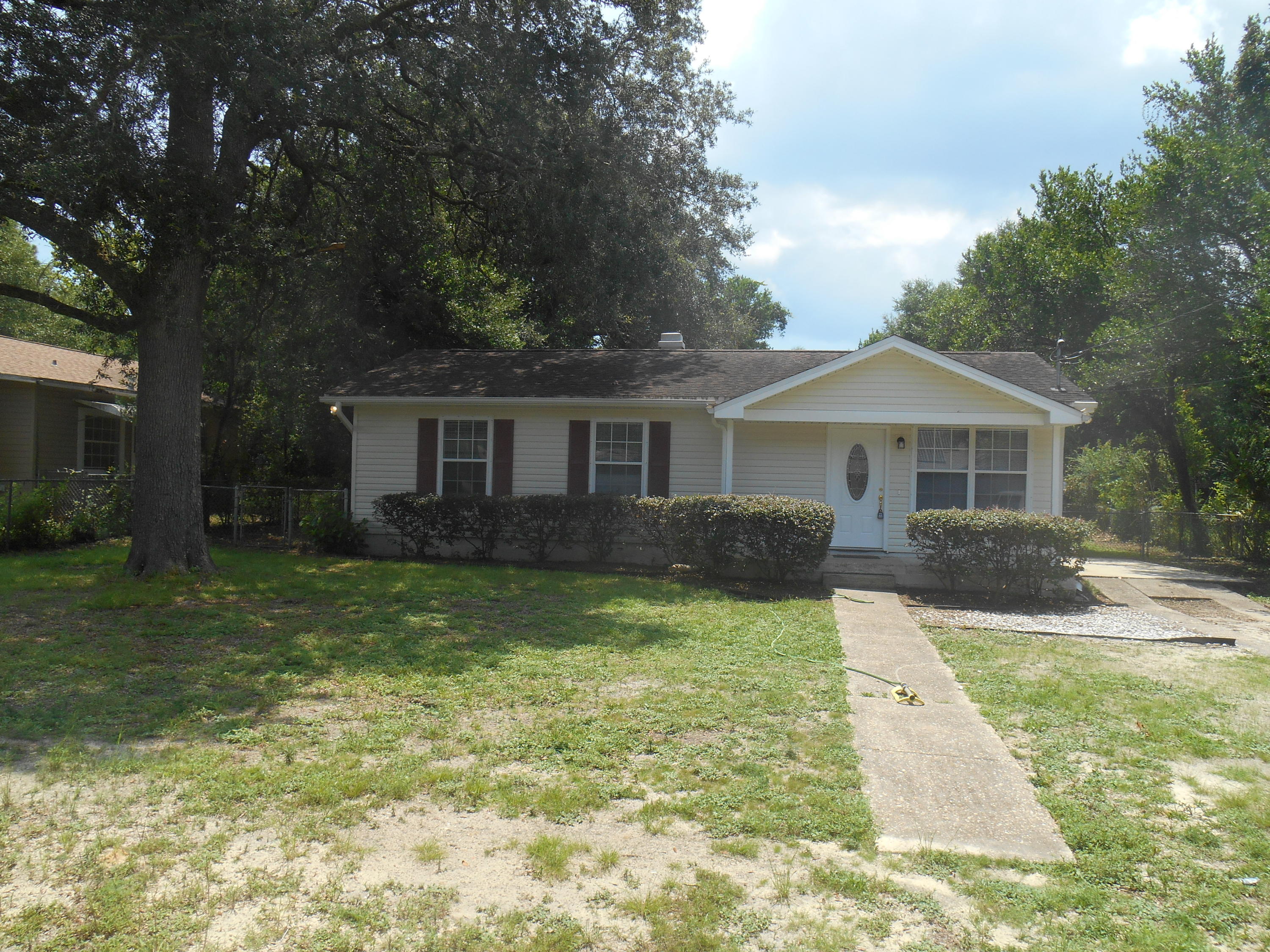 Welcome to this attractive 3 bedroom home on a .26 acre level lot with mature trees that provide great shade. Don't let the age fool you; it was totally remodeled in 2007 and the Property Appraiser lists an effective age of 1980. Newly painted and has a bright, open living room, dining room and kitchen. The ceilings have knockdown texture and there is orange peel on walls. There is a French door leading to a nice sized deck overlooking the backyard. The laundry room is on the inside and the HVAC replaced April 2013. The remodel included 30 yr shingles * Windows * Doors * Sheathing, house wrap and Vinyl siding for the outside. On the inside - All New Electrical Wiring, fixtures (installed panel larger than required for future additions) * All Plumbing Fixtures * * Insulation both in the walls and blown-in insulation in the attic * Kitchen Cabinets * Kitchen Appliances *  Countertops *Sink and fixtures * Bath Vanity, Mirror, Tub, and toilet * Tile throughout entire house * Drywall * 6 Panel Interior Doors & Hardware * Water Heater ** Seller is Real Estate Broker. Listing Broker/Salesperson has ownership interest in the property.  Buyer to verify all measurements.  Make an appointment today because this one wouldn't last long.