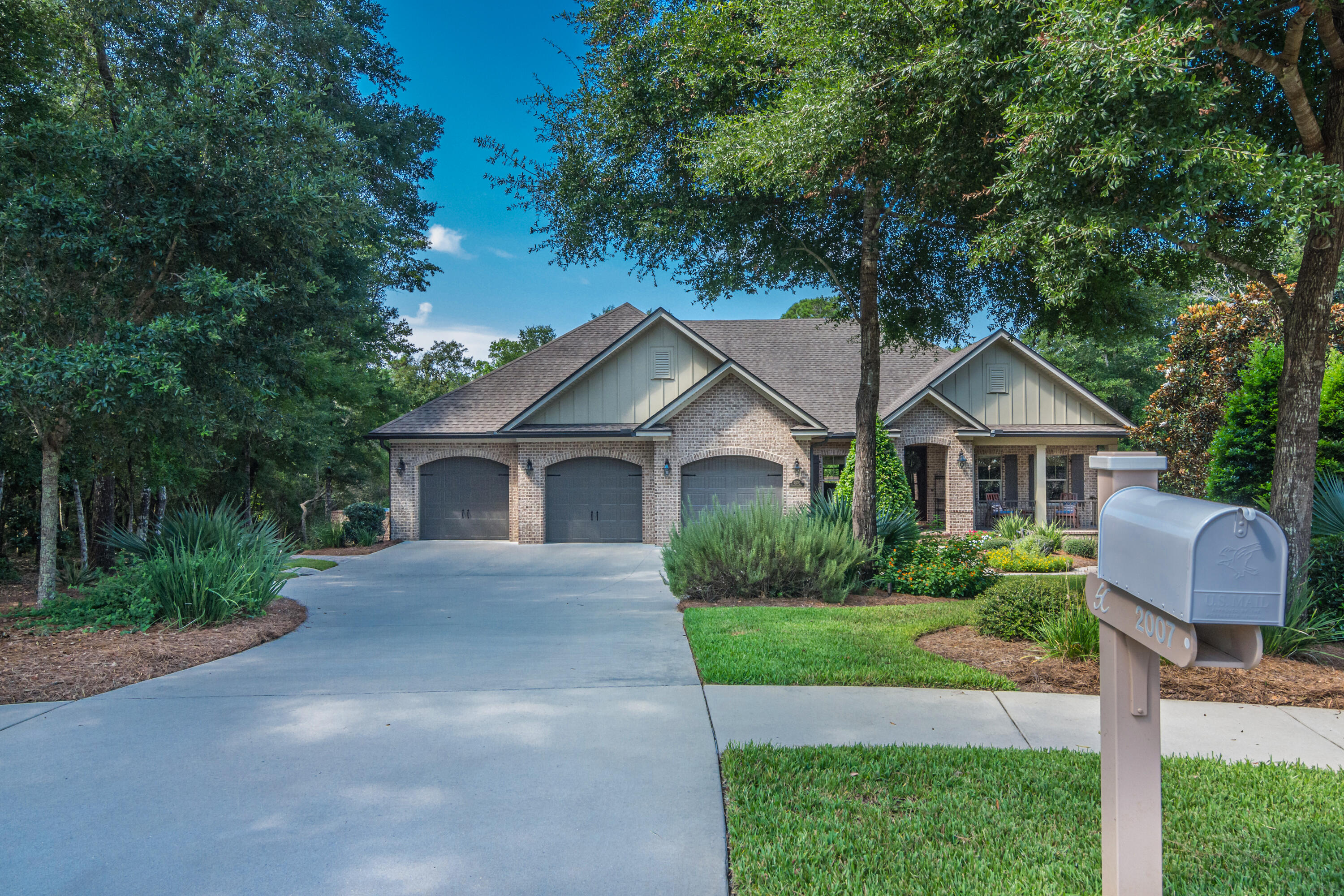 This stunning custom built home by Randy Wise is located on a private quiet cul-de-sac in the desirable Swift Creek neighborhood. If you are looking for tranquility and peacefulness, then this is the perfect home.  It boasts 4546 sq. ft. of high appointed finishes, surround sound, custom cabinetry, designer lighting, central vac, and hurricane impact windows in the dining area, master bedroom, and master bath. Added security provided by a built-in security system. Whole house Generac generator (with transferable 10-year warranty) installed in 2019 to automatically provide power for entire home. Master bedroom suite, two other bedrooms and office/study are located upstairs. Wood floors throughout most of upstairs, extra bedrooms have carpet. Gourmet kitchen features a large kitchen island with granite, high end cabinets, double oven, gas stove, refrigerator and large 8x5 walk-in pantry. 

The walk out basement includes a downstairs bar/kitchenette area with refrigerator, ice maker, microwave, and dishwasher. A 500 bottle environmentally cooled wine cellar is hidden nearby behind a sliding barn door. Adjacent is multi-purpose room currently used as a gym. Also located downstairs is another bedroom, office, full bathroom, Family room, dining room and sitting area, as well as a room being used as a craft room. Downstairs has plenty of extra storage.  The walk out basement flows onto a large paver deck with saltwater pool and jacuzzi that overlook the scenic wetlands of Swift Creek.  The view from the custom under-porch swing is punctuated by a mosquito free environment provided by an in-ground misting system.  As you leave the pool deck, landscaped lighting guides you up the newly installed paver pathways on both sides of the house. The three car garage features impact resistant doors, epoxy floor coating, custom shelving, and slat walls for easy storage.  This is a must see home today.