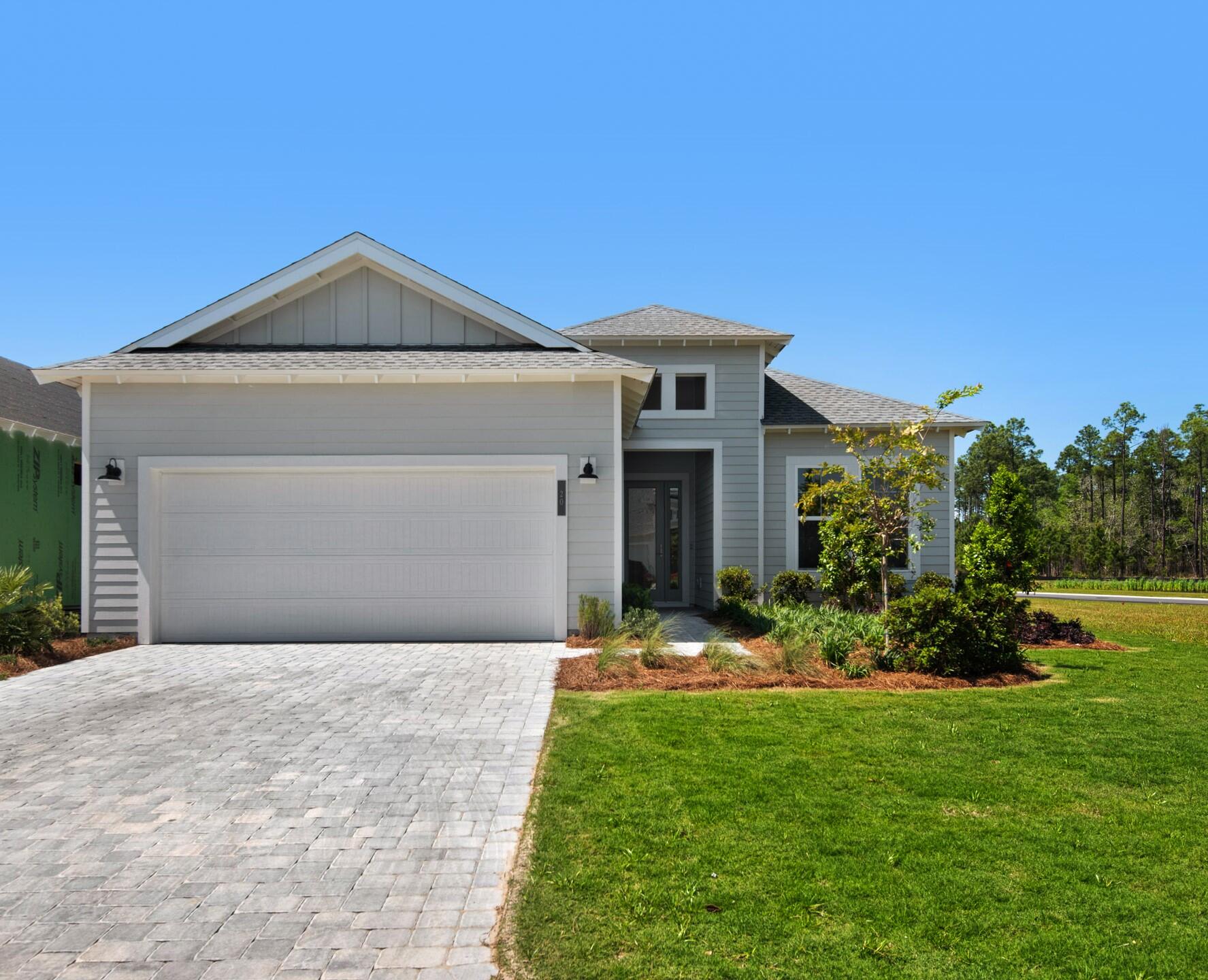 **NEW CONSTRUCTION** Located in Naturewalk Watersound Origins, the only gated section in Watersound Origins. The Marco pan, a single story home with three bedrooms and three baths plus a Den, and two car expanded garage. The plan includes an open-concept layout, gourmet kitchen, spacious great room and master suite.  The spacious covered lanai has a privacy wall and offers lake and preservation views.  Exclusive to Naturewalk residents, the amenities include lakeside fitness center, resort style pool (heated during fall and winter), and pickleball, tennis and outdoor social space called the Gathering Place.  Residents also have access to the Watesound Origins amenities and golf course.