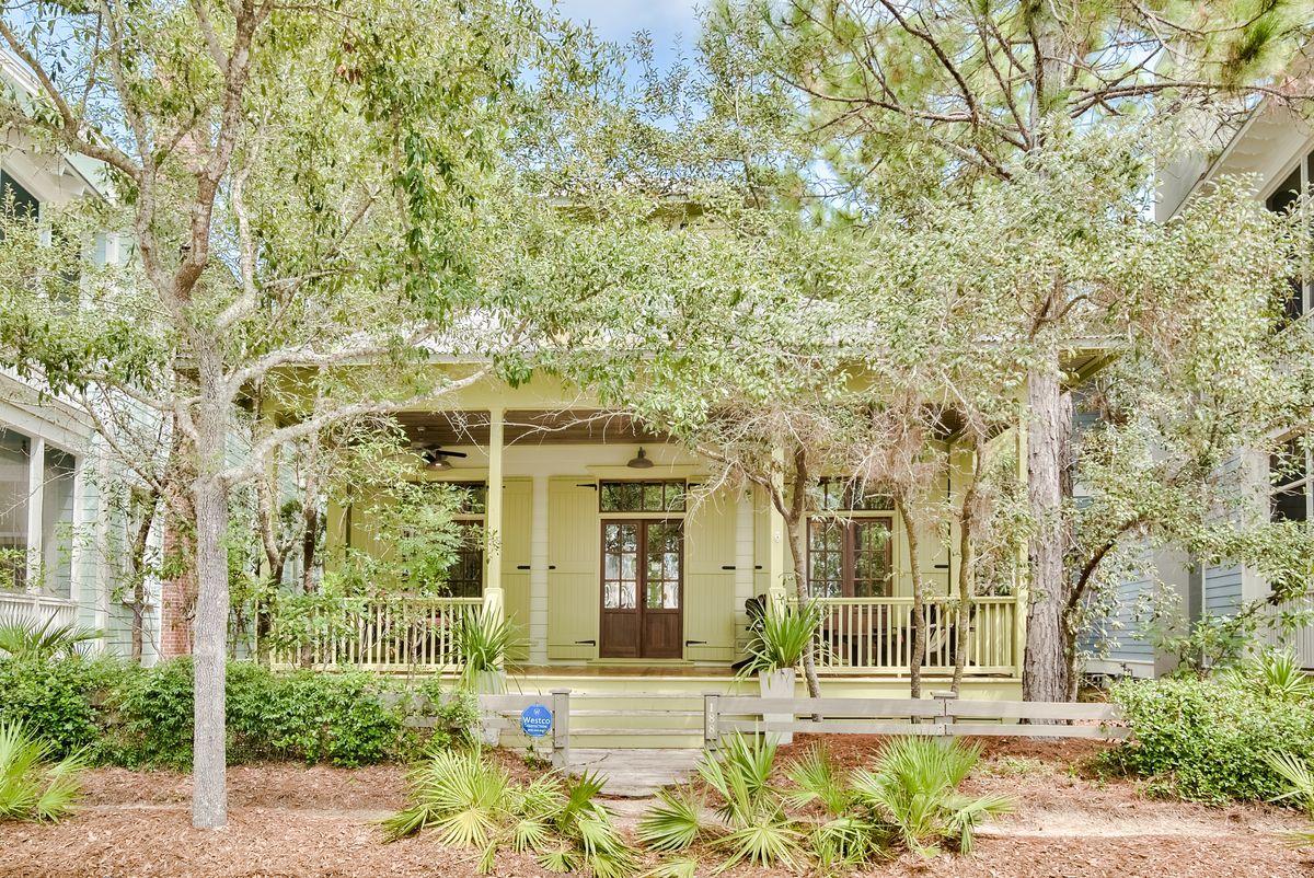 Come discover the perfect coastal beach cottage in Watercolor. This lovely home was built by renowned custom home builder, John Logan. An ideal beach cottage, with many interesting features and details, like the pitched tin roof, oversize transom windows, and wide wall wood paneling to name just a few. The screened back porch will surely be one the many favorite rooms you will enjoy family time in this cottage at the beach. The first floor has three king bedroom suites each with its own bathroom. There is also a separate powder room located near the living dining area. The second floor has a fourth bedroom with three queen beds and a full bath with tub and separate shower. The kitchen and living area are very spacious with high ceilings. The cottage is conveniently located in Phase II across from Camp Watercolor and the lazy River. This home has the ideal location to take in all that Watercolor has to offer. There is plenty of parking in front and behind the property. Beach cottage living just doesn't get any better than this!