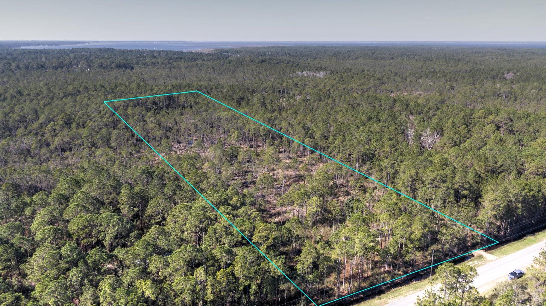 This 10 acre lot is located in the heart of Santa Rosa Beach, between the Choctawhatchee Bay and the Beaches of South Walton. A former wetlands report is uploaded to the Documents tab for agents. Close to restaurants, hospitals, schools, and shopping, this growing area is great place for residential home or homes.  Call Listing Agent for details. All information is based on available data and deemed accurate but as always, buyer to verify all information.