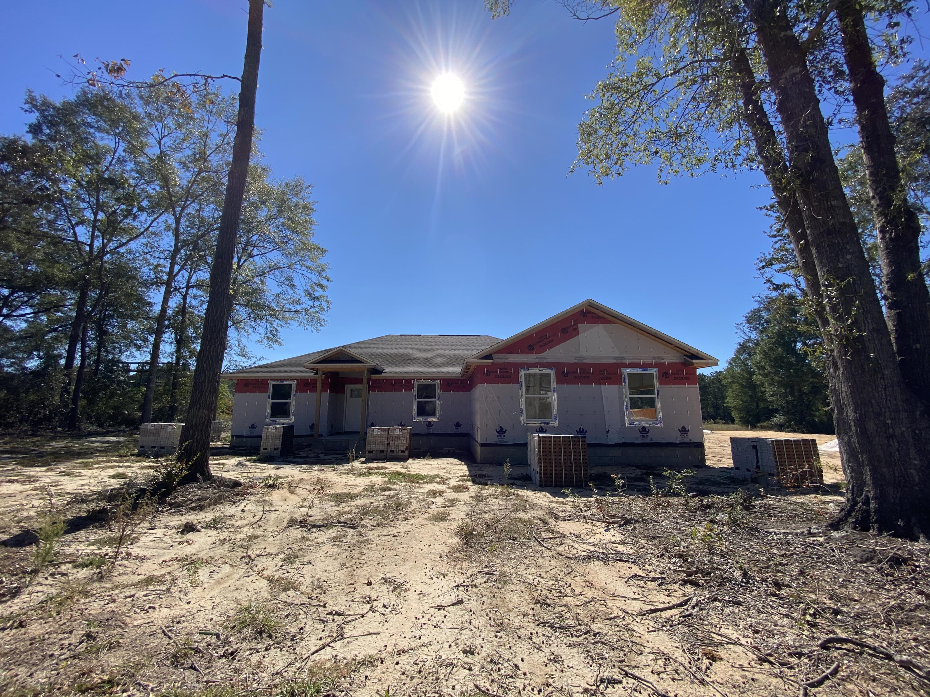 New construction! Award winning Builder! Estimated Completion by 01/15/21 .This quality built brick home located on a flat .70 acre level lot, which goes all the way to HWY 85, and features  4 bedrooms and 2 full baths, an open concept split bedroom design, side entry garage and beautiful finishes! You'll love the custom white shaker cabinetry and quartz tops throughout. Even the laundry features built in cabinetry! The yard will be fully sodded with irrigation system. Low E windows for energy efficiency, tray ceiling with crown molding  in the master bedroom. Located in the peaceful community of Lake Arthur Estates which offers residents a playground, basketball court, and beautiful lake to enjoy! Put this home on the top of your MUST SEE list and get it before its gone!
