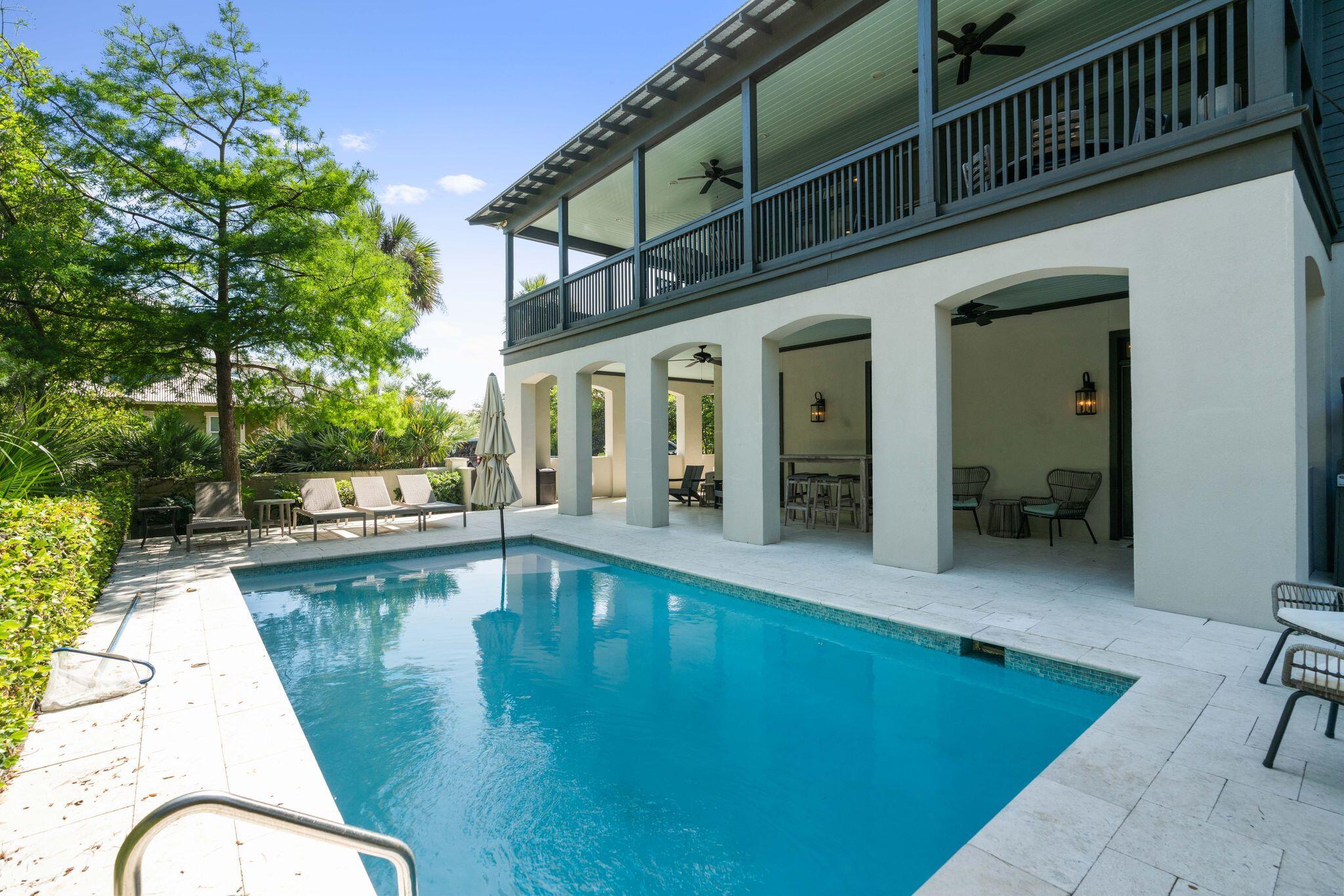 Welcome to the Southern Beach Charm of the Grits Carlton!!  Watch all your worries slip away as you lounge on one of the lovely porches, sit around the fire pit, jump into your own private pool or take a short stroll down the palm tree lined brick paver road to the emerald green waters and white sandy beaches of the Gulf of Mexico!  This Waters Edge home is located just west of Rosemary Beach and in a quaint gated neighborhood south of 30A!  The property offers 4 bedrooms, 4 full baths and a total of 2,670 square feet. The first floor offers a covered open porch overlooking the pool patio.  Grab a quick shower after a day at the beach at the conveniently located outdoor shower or grill up dinner while hanging with the crew!  One of the two master bedrooms is located on the first floor along with an additional bedroom.  Each of these bedroom offers their own ensuite. The second floor boasts an open floor plan making a great space to entertain and enjoy family time and is complete with hardwood floors, built in shelving and a fireplace in the living area, stainless appliances, breakfast island and glass fronted cabnitry in the kitchen!  Oh and lets not forget to mention the 650 square foot covered shuttered wrap around porch that has a dining area, several sitting areas and of course a swing! The children will love the bunk room also located on the sec and floor that also has its own ensuite bath! The third floor is the master retreat and has a large ensuite bath and Gulf views from its private porch! The Grits Carlton is beach living at its best!  Do not miss out on this one!  Homes in this neighborhood to not come onto the market often and it will go quickly!  Call for a showing today!