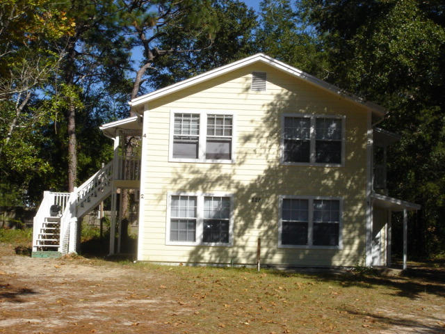 AVAILABLE OCTOBER 15!
Upstairs unit in a quadruplex. This building was completely renovated in 2007. Unit has full size appliances and tub/shower combination in the bathroom. Unit has a covered front and back porch. Convenient location close to schools, restaurants and waterfront park. 2 miles to the Eglin AFB east gate. Includes water, sewer and garbage as well as lawn maintenance. Tenant responsible for electric and TV/internet. Available immediately. Credit check and background check required.