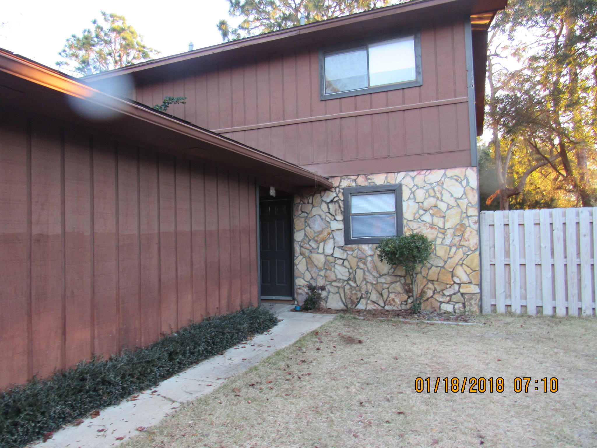 Large townhome in a semi-private location in Shalimar with large back deck! 3 bedroom unit with 2 and 1/2 baths and a one car garage and extra parking on the side. Lots of kitchen cabinets! Wood laminate floors in living room. Master bedroom has shower only and second bedroom has a balcony that looks over the backyard. The backyard is privacy fenced and has a large deck. Small pet upon approval of owner with restrictions. No smoking inside unit or garage. Showings begin on Feb. 4th.