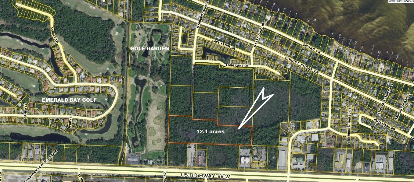 This is an excellent estate property to build your mega-private home on 12 acres (4 uplands with 8 acres of private wetlands) A very unique opportunity to own one of the largest single family estates in Miramar Beach.  Walton County has purchased the north 10 acre quadrant of the Golf Garden for a county park. The DOT is planning a four-way intersection with stoplight at the junction with Hwy 98 W.