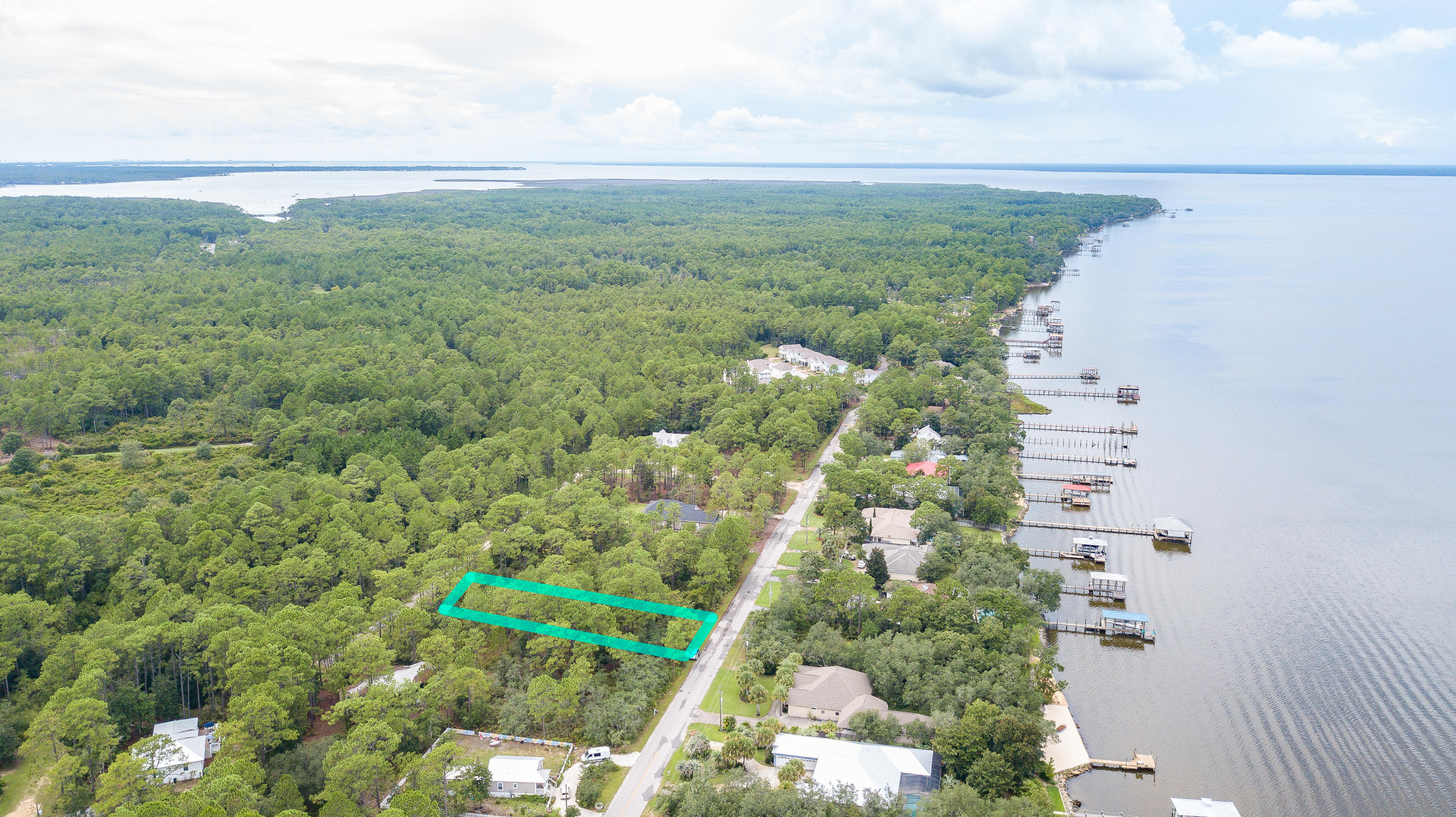 Great opportunity to build your dream home, or two! Prime location directly across the street from Choctawhatchee Bay and within walking distance to Kellogg Bayside Park. Close proximity to South Walton's sandy white beaches and 30A's restaurants and boutiques. This half acre parcel is accessible from either E Nursery Road or Elise Street and consists of 2 quarter acre lots which can be purchased separately.