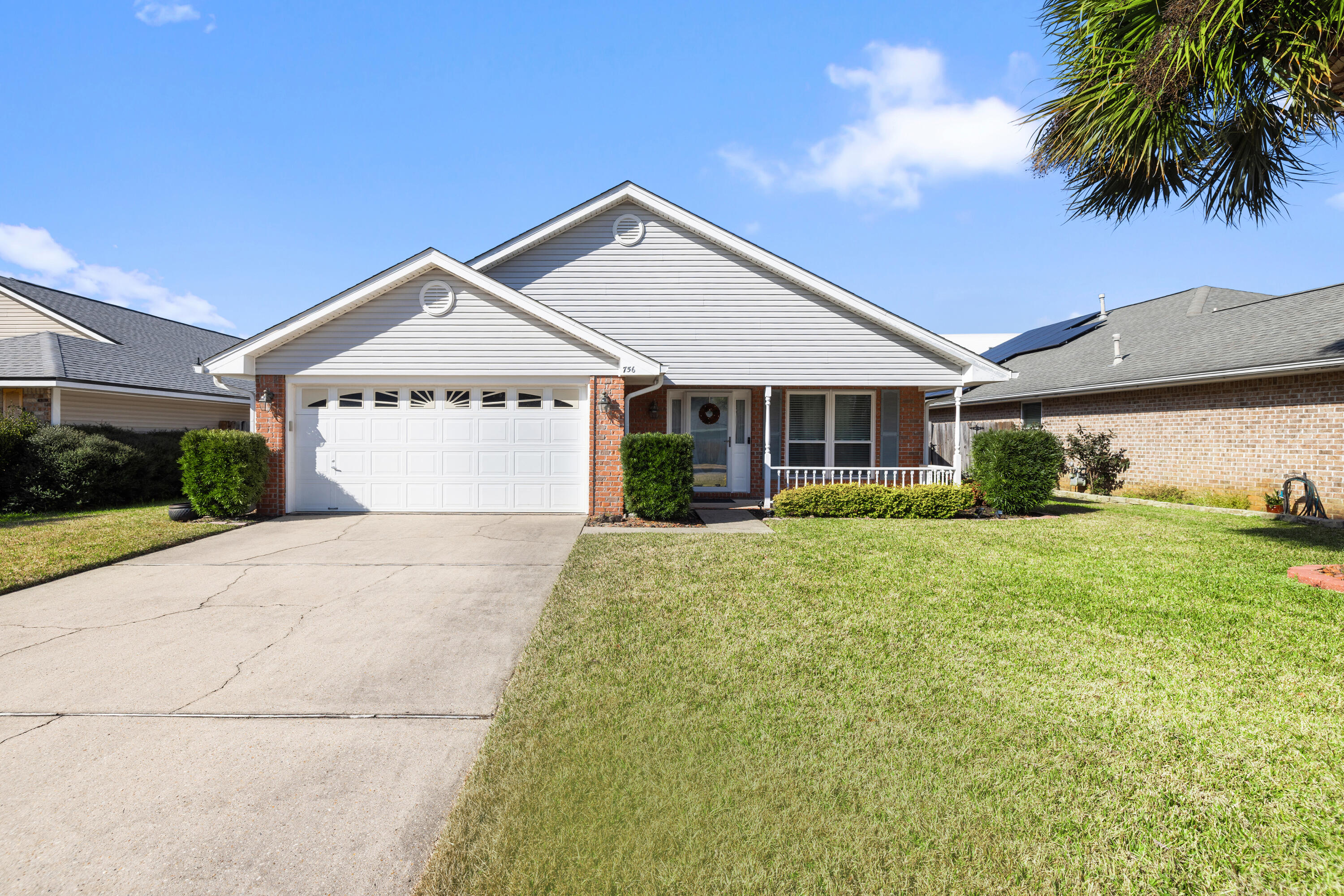 This inviting Florida home offers a smart blend of comfort, functionality, and thoughtful updates throughout. The main living area is filled with natural light and anchored by a gas fireplace, creating a comfortable and welcoming atmosphere. The kitchen opens seamlessly to the living and dining areas, making it well suited for both everyday living and entertaining, and features quartz countertops, stainless steel appliances, and an efficient layout. An additional space provides flexibility for formal dining, a home office, or a secondary living area.

The primary suite offers double vanities with quartz countertops and a spacious walk-in closet. Two additional bedrooms and a full bathroom are conveniently located nearby, providing flexibility for guests or family.

Additional features include an interior laundry room with washer and dryer, a two-car garage, and a fully fenced backyard with room for pets, play, or outdoor enjoyment. A screened-in patio enhances the outdoor space and overlooks a thoughtfully planned backyard complete with a fire pit and a small storage shed.

Well maintained and move-in ready, this light and bright home is ideally located near military bases and the Emerald Coast beaches. Recent updates include a roof in 2016, water heater in 2018, HVAC in 2019, and windows in 2020. Schedule your private tour today.