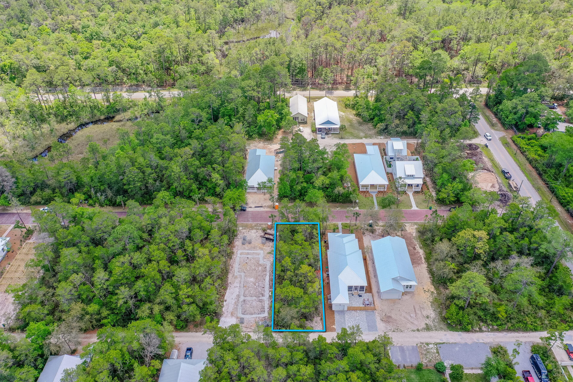 Do not miss your chance to purchase this amazing home site just a couple blocks from the bay! Grayton Bayou is the perfect location to enjoy all that South Walton has to offer! Grayton Bayou is located within only 5 minutes north of Grayton Beach by the Pt. Washington State Forest. Build a fantastic beach home in a community with bricked paved streets, shaded pathways, underground utilities, community pool and bayou access. This lot is not far from the Grayton Bayou community pool, a short walk to the boat ramp, bayfront park, and a quick drive to the beaches of 30A!