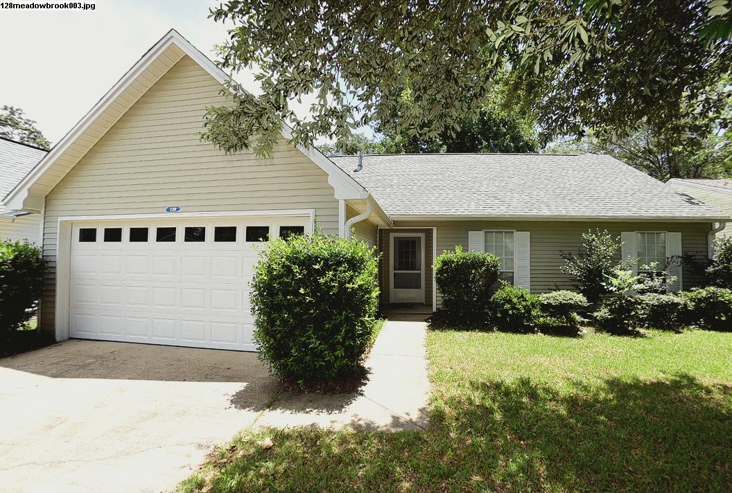 Charming, well maintained 4BR home in quiet subdivision. Minutes from schools, bases, and shops. Front entryway leads to a large living area with vaulted ceilings ( fireplace cannot be used). Dine-in Kitchen features stainless steel appliances (ice maker not warranted), and large windows to let in all that sunshine. 3 BR's on the main level, including Master Suite w/ connected full bathroom. Upstairs, you'll find a large room that can be a 4th BR, kids play area, or home office. Screened patio opens up to a fully fenced backyard. Access to Community Pool included in Rent. NO SMOKING. NO PETS. ..NO ROOMMATES. Any person 18 years or older must apply separately. Tenants required to carry renter's liability insurance.