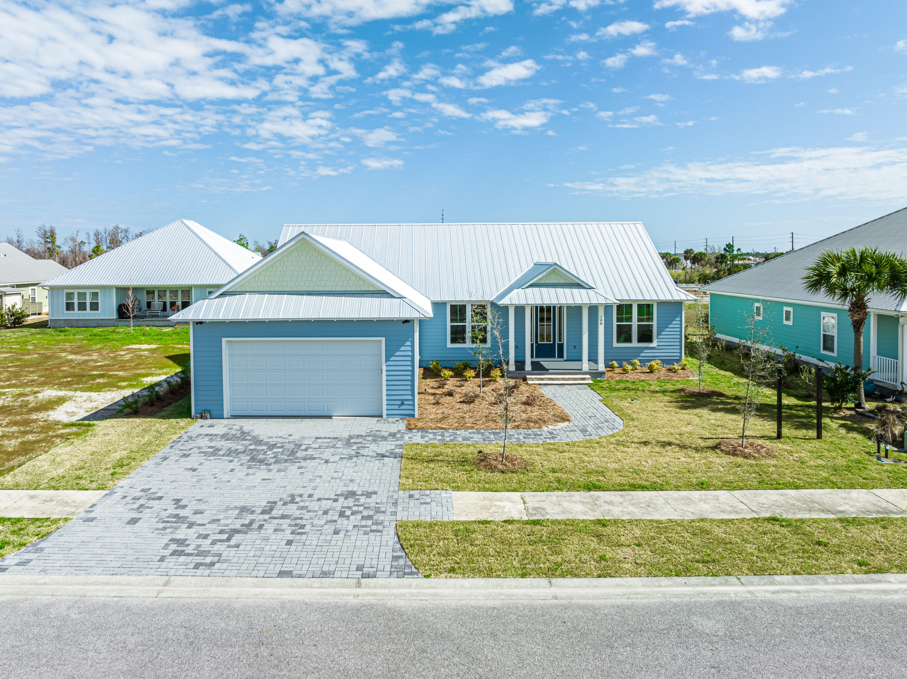 Under contract ~ taking back ups. This could be your dream home on the coast! NEW 1925' open floor plan home on spacious lot just a golf cart ride or 1/2 mile stroll to beach! Open living/dining/kitchen concept with 4 br/3 ba. Kitchen features quartz countertops/white cabinets and island area. Master suite, positioned opposite the other 3 bedrooms for privacy, master bath with tiled ex-large shower with double sink vanity, large master closet. Exterior features to include newly sodded yard, palm trees, plush landscaping. The screened lanai with gas hookup for your grill is a beautiful area to unwind after a day on the beach. The Developer has a stellar reputation, only builds a select few homes each year, and all his homes withstood the Hurricane with no structural damage.