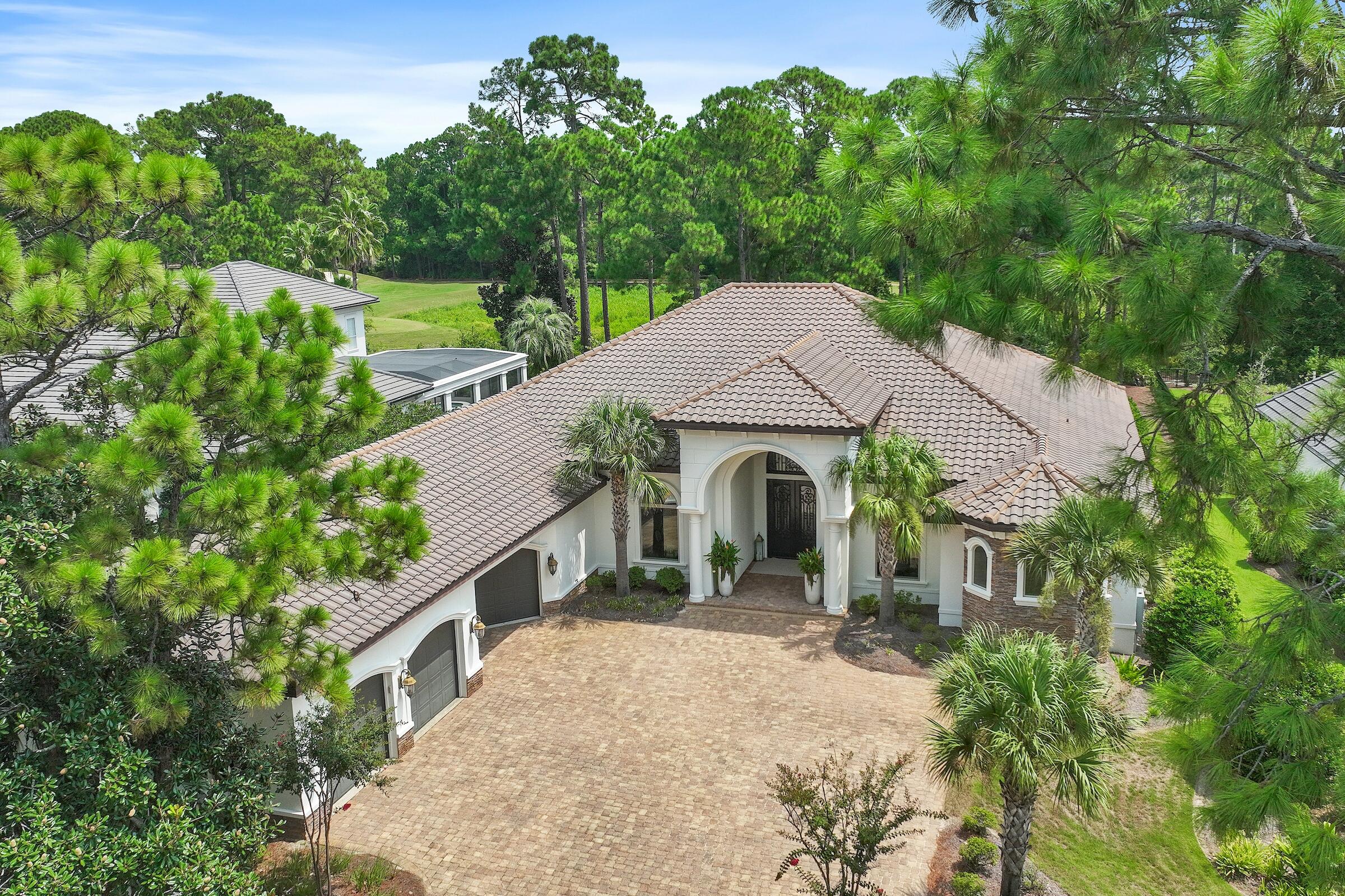 Outdoor fireplace! Welcome to 3585 Preserve Lane, nestled in the secure enclave of Burnt Pine, a private gated section of Sandestin Golf and Beach Resort. Residing in Sandestin offers a unique way of life, characterized by a wealth of amenities readily available to its community. The perks of living here encompass a world of amenities all within your own neighborhood, including private beach and beach club, Marina, tennis center, multiple golf courses, a fitness center, spas, numerous swimming pools, a year-round schedule of events and a wide variety of dining and shopping. This extensive suite of amenities serves to enhance the residential experience in Sandestin. Click ''more'' to continue. Built in 2016, the residence at 3585 Preserve Lane boasts a contemporary and pristine look. Spanning a spacious and open floor plan, it encompasses four bedrooms, four full baths, one half bath, an exclusive office, a swimming pool, a summer kitchen, plenty of covered outdoor entertaining space, an indoor and an outdoor fireplace, and a three-car plus golf cart garage. This home provides ample space and luxurious amenities to ensure a comfortable and refined lifestyle.