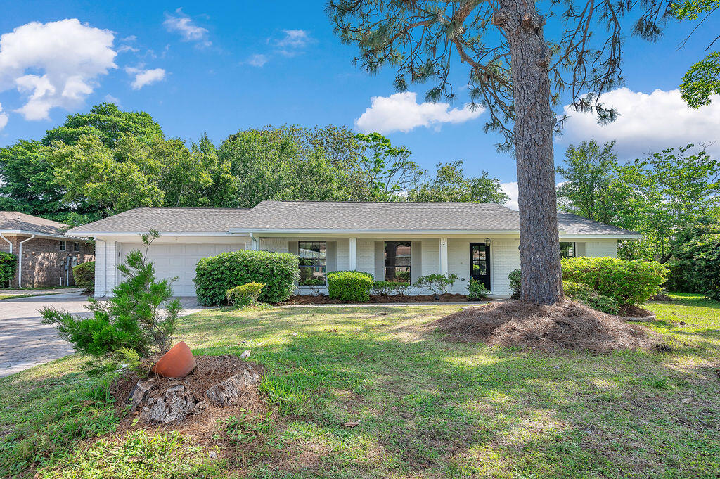 This home is outstanding; curb appeal galore! When you fist drive up you will love the covered front porch, new front door, paver driveway, new roof, and exterior brinck with fresh paint and Florida shutters!

The home has been completely gutted and remodeled with all new finishes! The open floorplan invites you in with sweeping views of the brand new kitchen with quartz countertops, all new appliances, custom kitchen cabinets and top-of-the-line plumbing fixtures.

The home has new vinyl flooring, neutral paint and all new baseboards. 

The laundry room is situated off to the side of the kitchen and is oversized with custom cabinetry. This area also has access to the garage which has been completely renovated too, there is no surface untouched! On the other side of the home are 3 additional bedrooms with a beautifully appointed hall bathroom with tub/shower surround, new toilet, new vanity, all new lighting, and plumbing fixtures. 

At the end of the hallway is the master bedroom with a large walk-in closest. The master bathroom is absolutely gorgeous with custom tiled walk-in shower, beautiful new vanity, new toilet, new lighting, and plumbing fixtures.

The additional 3 bedrooms are all spacious and each have ample natural lighting.

The backyard is fully fenced and has a sprinkler system installed. The HVAC is newer, copper wiring and the Roof is 2024.
