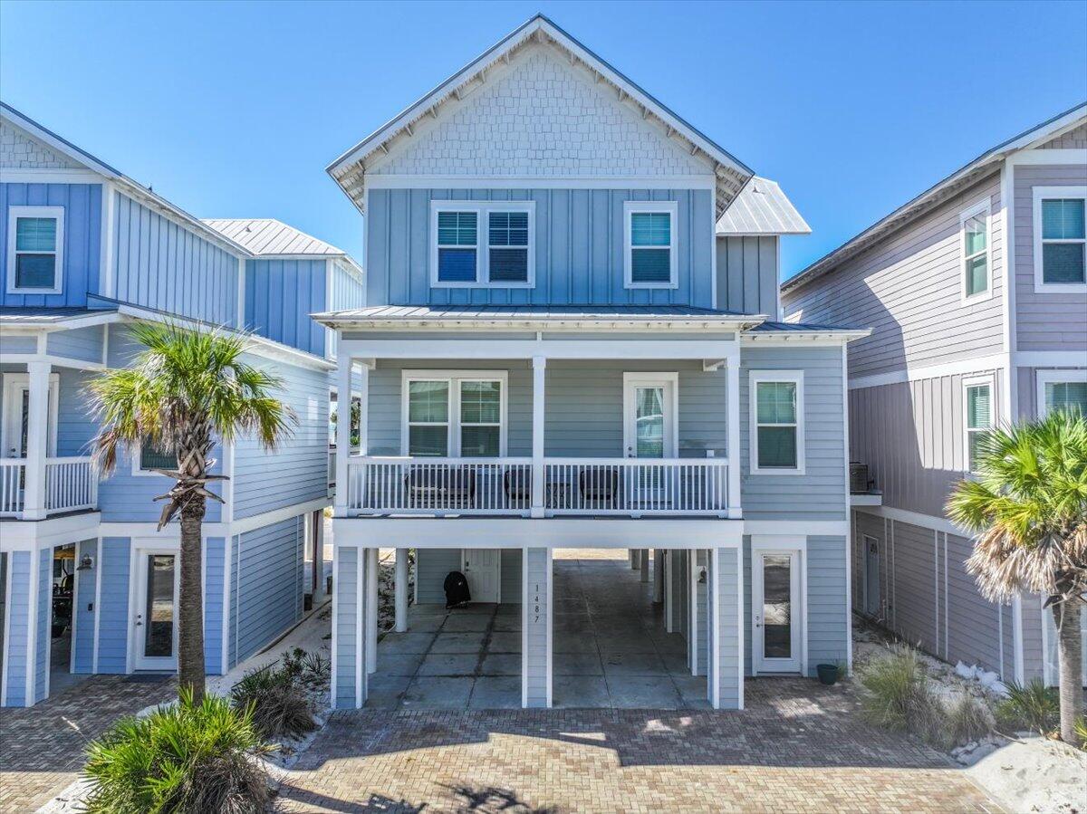 Welcome to your Navarre beach paradise at 1487 Seaside! This stunning 4-bedroom, 3-bath coastal retreat is being sold fully furnished—just unpack and start living your best beach life. Enjoy fresh interior paint, new flooring, newly remodeled full bath on the main level and an open-concept layout with a chef's kitchen perfect for entertaining. Relax on the wrap-around porch with breathtaking Santa Rosa Sound views, or sip coffee on the front deck as the sun rises. Located in the gated ''By the Sea'' community with amenities including a pool, spa, BBQ area, and deeded Sound access, all for only $100/month. The Gulf of Mexico is just a short golf cart ride away. Don't miss this turn-key coastal gem—your dream home awaits at 1487 Seaside!