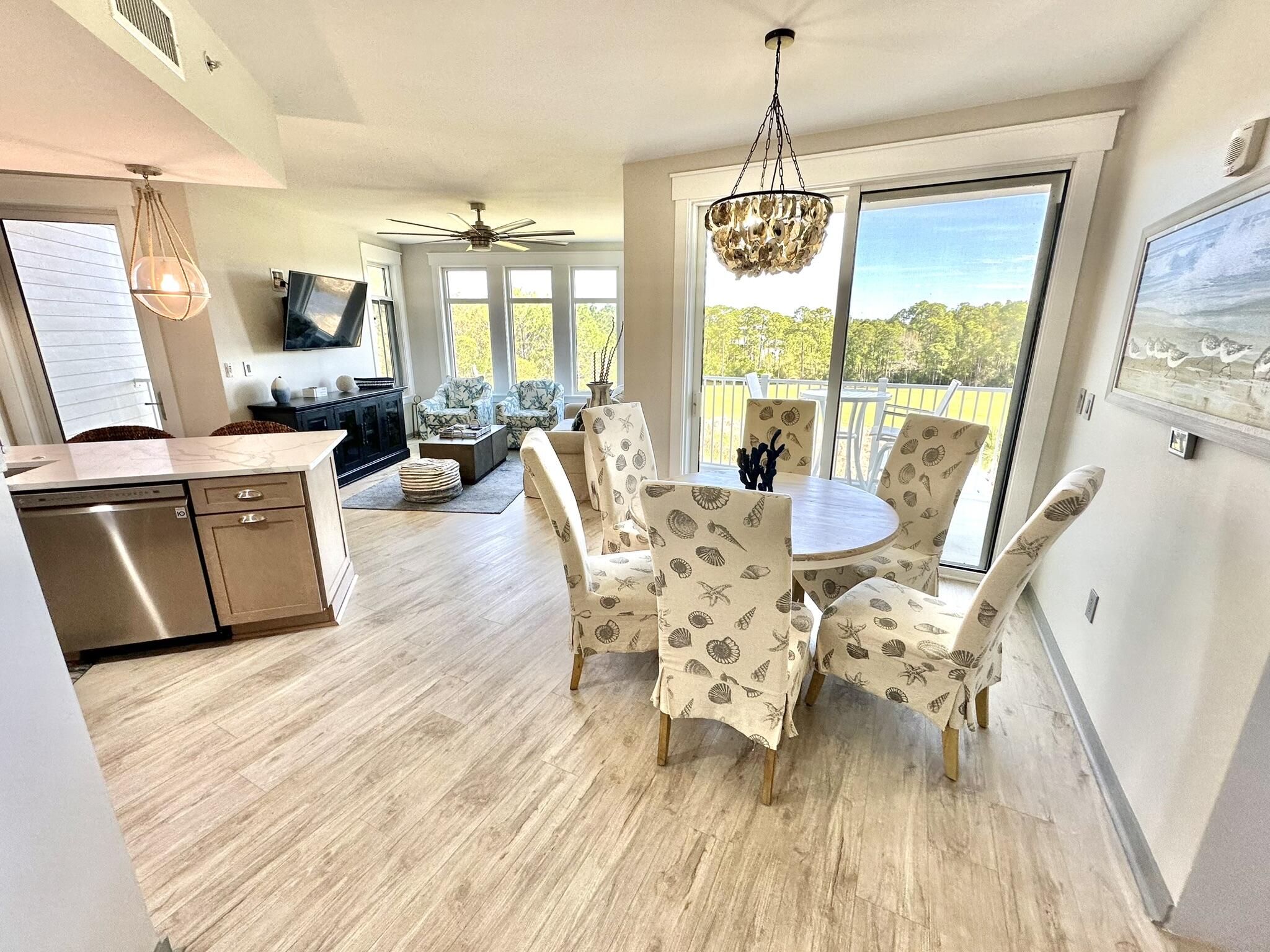 Are you looking for an investment rental that is consistently occupied?  If you can get in to see it between guest stays, look no further.  This beautifully remodeled lock-off Unit in Elation features a separate 1 bed/1 bath & a studio that combine to make a 2 bedroom/2 Bath double Unit!  Enjoy the quiet of nature on your private covered balcony overlooking the golf course and serene lake. Conveniently situated a short stroll from the action and entertainment of Baytowne Wharf, the Conference Center and full-service marina.  All the fantastic amenities that Sandestin Golf & Beach Resort provide are a cart ride away. With an abundance of natural light from all the windows and beautifully decorated with unique appointments, high-end furnishings and appliances, this Corner Unit is a stunner!