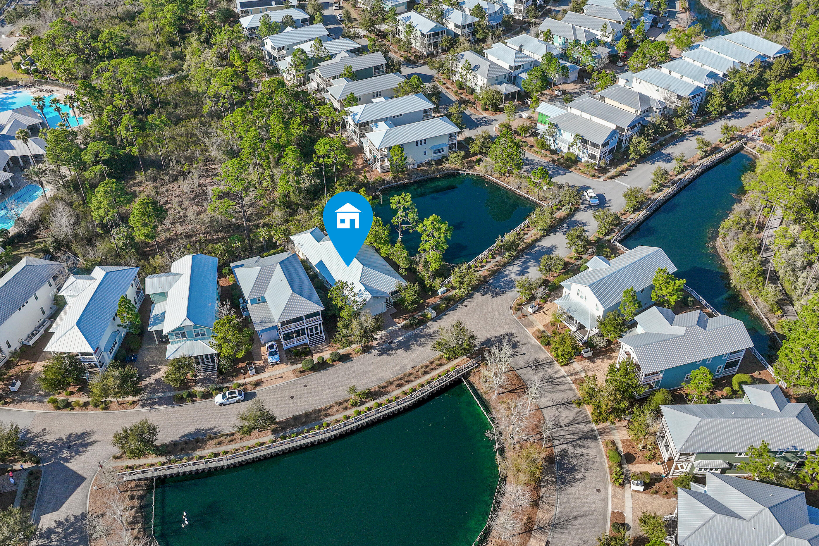 Experience the refined coastal lifestyle of 30A in this beautifully furnished Beachwind floorplan, a rare single-story residence ideally positioned on a premium corner homesite overlooking pond views and protected preserve, offering exceptional privacy and peaceful natural surroundings. Located south of Highway 98 in the highly coveted community of NatureWalk at Seagrove, this immaculate never-rented home is just a short stroll to the community's resort-style pool, amenities and within a mile of the renowned sugar-white sand beaches of the Emerald Coast.
Enhancing the coastal lifestyle, the home includes a six-seater golf cart, perfect for effortless rides along Scenic Highway 30A to nearby cafés, boutiques, coastal destinations such as Seaside and Watercolor. Rarely available within the community, this thoughtfully designed single-level home with a desirable two-car garage is offered fully furnished and turnkey, featuring three spacious bedrooms, two-and-a-half baths, and 1,863 square feet of beautifully curated living space.  The layout seamlessly blends elegance, comfort, and privacy in one of 30A's most desirable communities.
The open-concept design blends timeless coastal elegance with everyday comfort.  At the heart of the home is a stunning chef's kitchen showcasing stainless steel appliances, a GE gas cooktop, and a generous granite island with seating for four, ideal for entertaining and gathering with family and friends. Coastal character is showcased through shiplap accents and hardwood floors throughout the home, creating a warm and sophisticated atmosphere.

The inviting living room features hardwood floors, recessed lighting, and a beautiful fireplace with mantle and mounted television. A wall of windows fills the space with abundant natural light while framing tranquil wooded preserve views, creating a bright and relaxing setting perfect for both everyday living and hosting guests.

Privately situated at the rear of the home, the spacious primary suite serves as a peaceful retreat, complete with hardwood floors throughout, a tray ceiling with recessed lighting, and large windows that bring in natural light. The ensuite bath offers dual vanities, a walk-in shower, private water closet, and a generously sized professionally designed walk-in closet.

Additional notable features include a Culligan whole-house water softener system, HVAC installed in 2025, and the convenience of the attached two-car garage, providing ample storage and parking.

Residents of NatureWalk at Seagrove enjoy an amenity-rich lifestyle designed to celebrate the area's natural beauty. Scenic nature trails wind throughout the community and connect directly to the beach, while The Gathering Place offers a heated lap pool, zero-entry pool, hot tub, fire pit, grills, bar area, outdoor TVs, playground, and ample gathering spaces. The community also features fitness stations, multi-purpose courts, and pickleball courts.

Ideally located just off Scenic Highway 30A and adjacent to WaterColor Publix, the community offers easy access to beloved coastal areas including Seaside, WaterColor, and Seagrove Beach, to some of the finest dining, boutiques, and beach experiences along 30A.

Whether you are searching for a primary residence, second home, or investment property, this rare one-story offering presents an exceptional opportunity to enjoy the relaxed elegance of the 30A coastal lifestyle in NatureWalk at Seagrove.