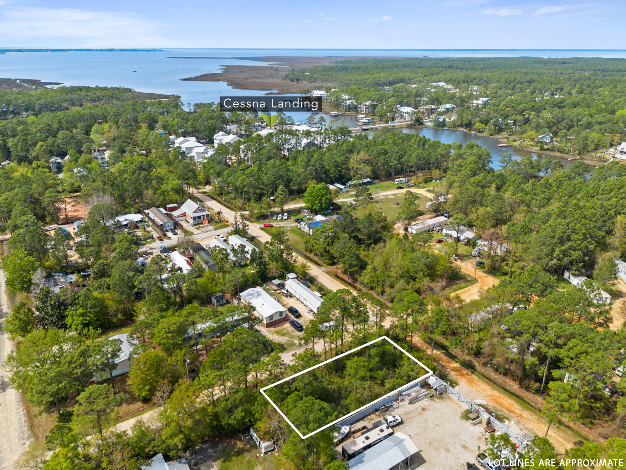 Discover the perfect canvas for your dream home! This centrally located 50x132 lot offers convenience and charm, with water and sewer services available through Regional Utilities. Just minutes away, Cessna Landing County Park provides endless recreational opportunities, from boating and fishing to picnicking and play. Explore the rich history of old town Santa Rosa, while enjoying proximity to dining, shopping, and the beach. Adjacent to the park lies the Bayou Arts Center, enriching the community with cultural experiences. Embrace coastal living at its finest - your oasis awaits! Plus, this lot comes with a current survey, making your building process even smoother.