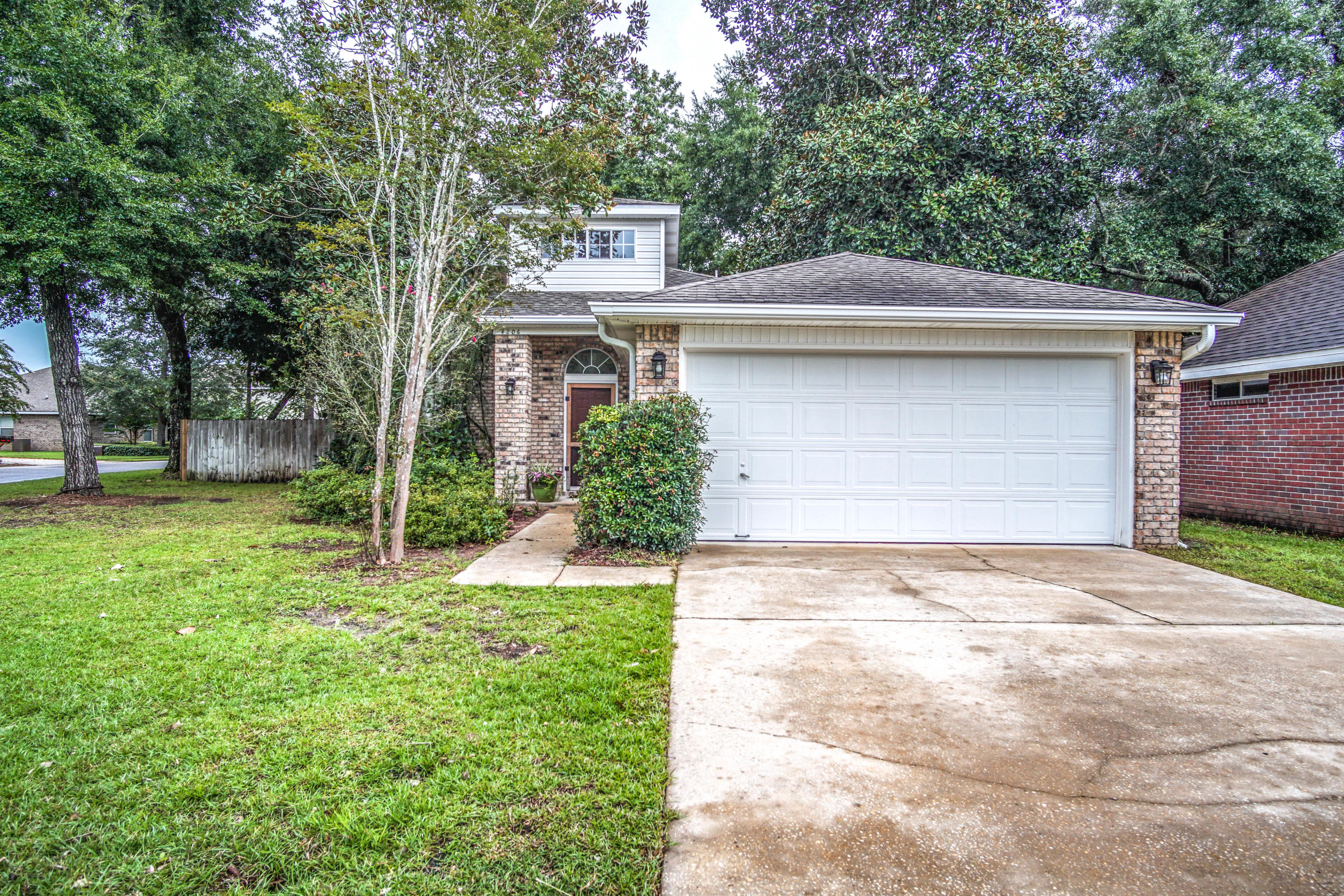 Fantastic Bluewater Bay home on a large corner lot with HUGE kitchen and granite counter tops! This two story home enjoys the convenience of the master being downstairs with ample room for large furniture. In the en suite master bath you will enjoy the large soaking tub with great natural but private lighting, walk-in shower, dual vanity, and 2 walk-in closets! This home has tall ceilings, laminate easy to clean flooring, a spacious rear deck and corner lot with tons of room to play! The home is equipped with natural gas for the stove, laundry and fireplace. Also, there is a two car garage, fenced in backyard with double gate and mature trees surrounding the home. Also if you are a pet owner there is a built-in doggie door to the backyard! lighting. New double oven/range and dishwasher All other appliances are new within 5 years and all kitchen appliances convey. Backyard has a brand new deck from fence to fence off the door that makes for a perfect entertaining area. Side double gate in backyard as well for trailer or anything else big needed to get back there. Also if you are a pet owener, built in doggie door to the backyard.
Don't miss out on this amazing home in a great location in Bluewater Bay.