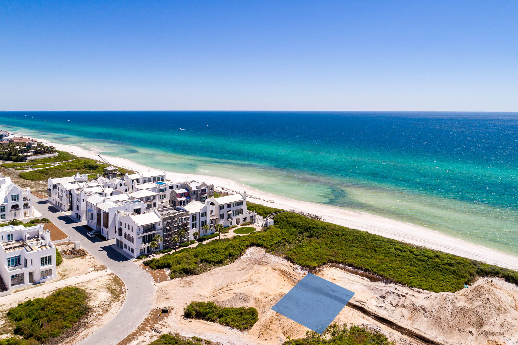 This homesite, located beachside, 2nd tier from the beach allows for a 3-story courtyard home, providing views of the Gulf of Mexico.
Nestled on 158 acres along the emerald waters and serene white sand beaches of Northwest Florida's Gulf Coast, Alys Beach is a New Urban community created with the highest standards for beauty, sustainability, and quality of life. White masonry homes are inspired by the harmonious architecture of Bermuda and Antigua, Guatemala. Courtyards meld indoor and outdoor spaces. Parks and trails preserve the wonder of a unique coastal habitat.