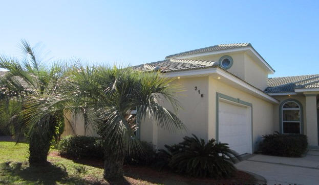 What a beautiful 4 bedroom, 2.5 bath REO home on a lake in Emerald Lakes! This home features raised treyed ceilings, crown molding, an open floor plan, fresh paint, new carpet, travertine floors, new stainless appliances, built-in bookshelves and a wonderful view of the lake. The location is convenient to all the Resort has to offer! This is a Fannie Mae Homepath Property.