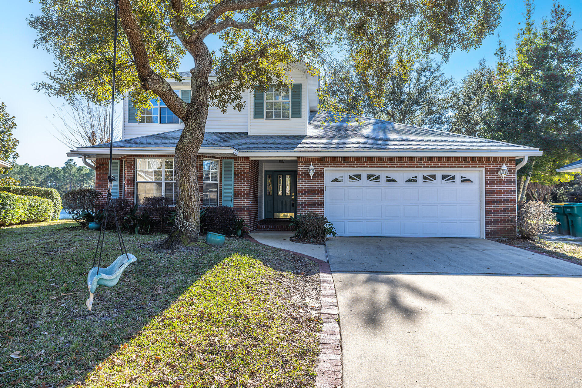 Beautiful LAKEFRONT HOME tucked away on a cul-de-sac in Bluewater Bay! Features 4 bedrooms, and 2.5 bathrooms. NEW ROOF installed in 2022.
Large kitchen with cherry cabinetry, granite countertops, stainless steel appliances, and an island with breakfast bar. Connected to the kitchen is a sunny breakfast nook with a tranquil view of the lake. 
First floor primary bedroom with bay window; En-suite bathroom with double vanity, garden soaking tub, separate stand-up shower, and a huge walk-in closet. Additional bedroom, and a 1/2 bath complete the first floor.
Upstairs are 2 large bedrooms, and a full bath. Storage space upstairs with potential for buyer to finish with heating/cooling and transform it into a bonus room! The backyard offers a large deck, perfect for relaxing and taking in the gorgeous lake views. 2-car attached garage with epoxy floor coating.