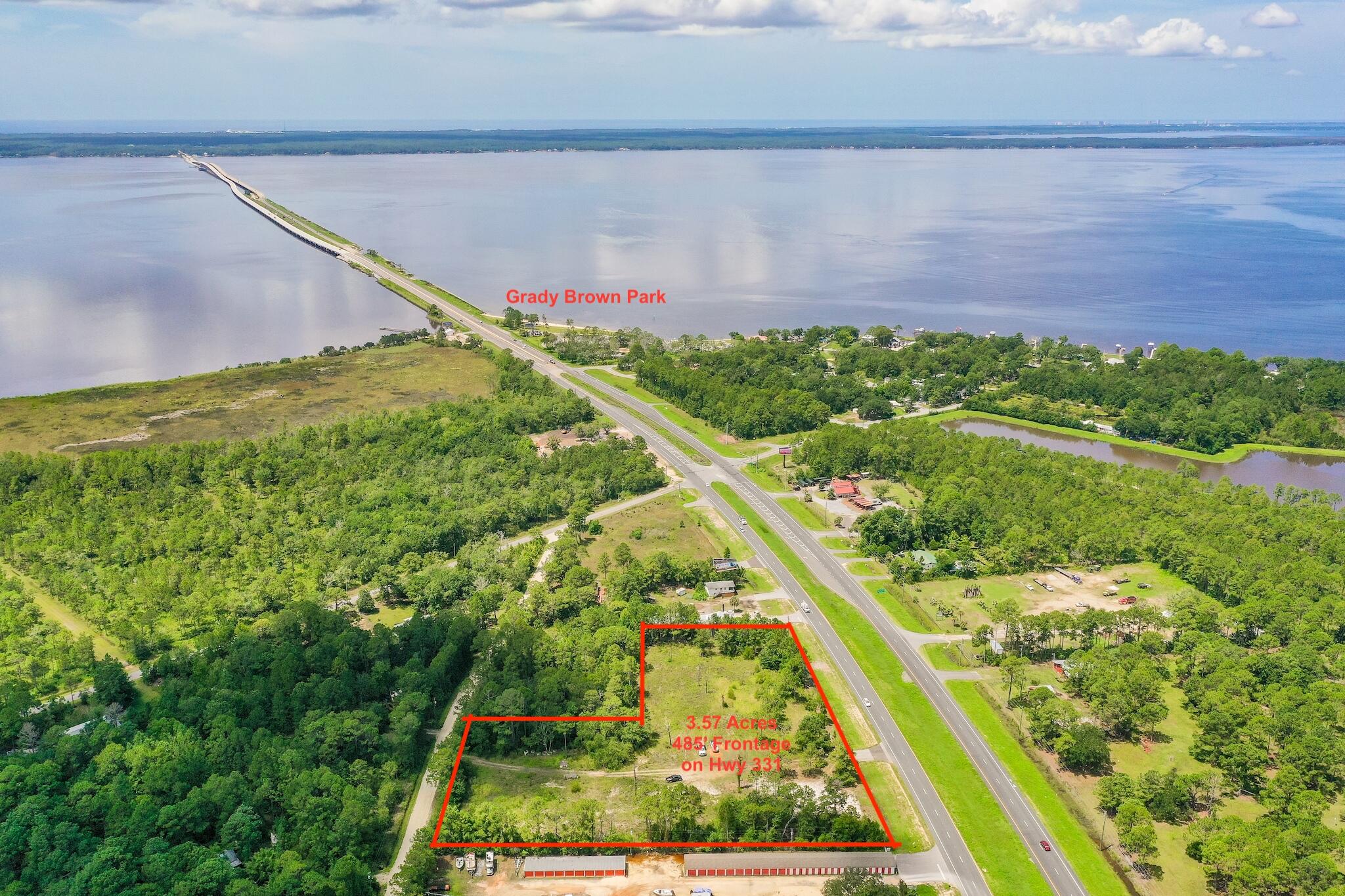 3.57 acres zoned General Commercial just north of the 331 Bridge.  Offering over 485 ft of highway frontage this is a PRIME location for a new or growing business! The property completed the zoning change in 2019.  Wetlands determinations shows approximately 3.53 acres of uplands and .04/acre of wetlands toward the rear of the property.